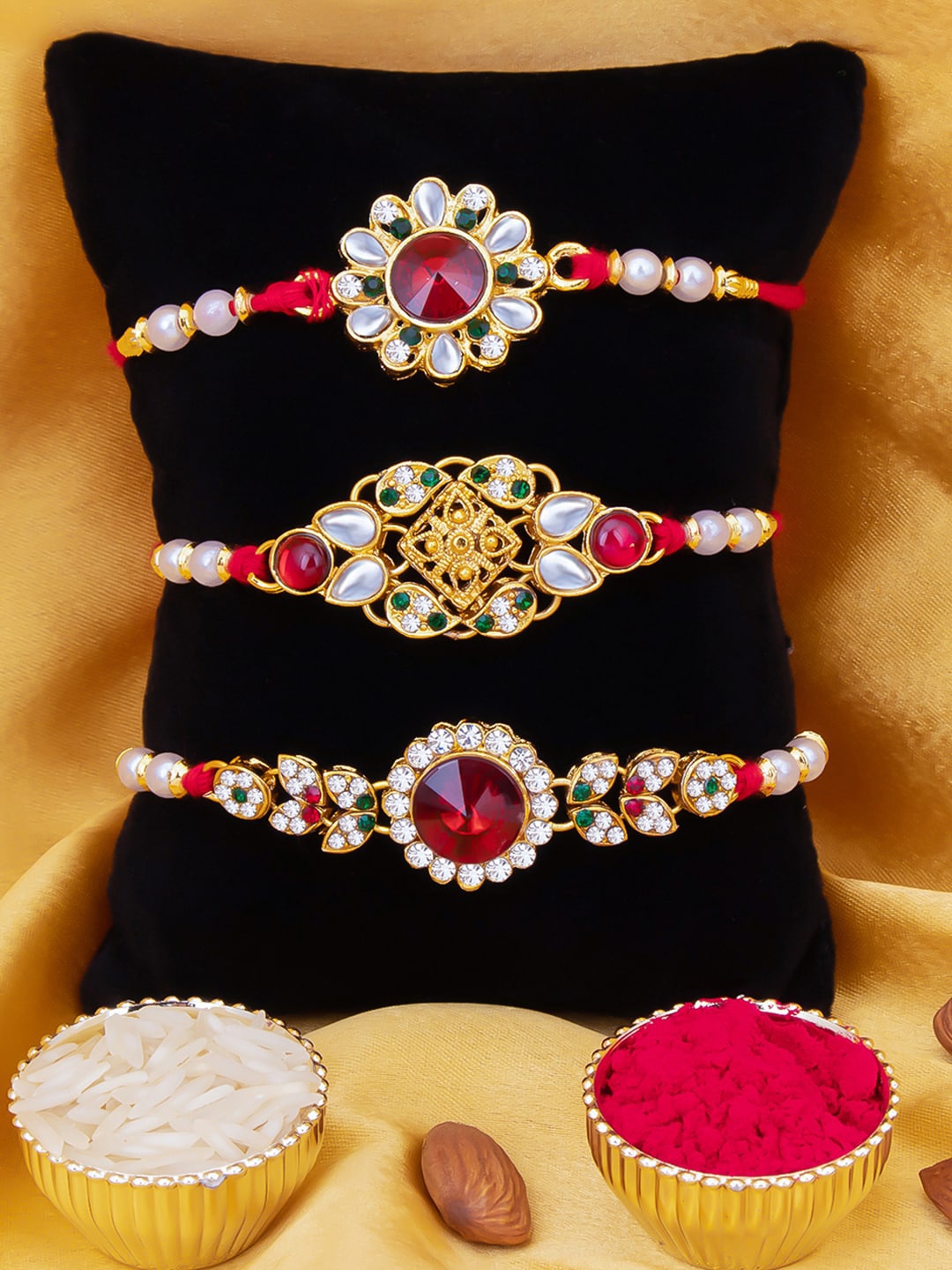 Sukkhi Rakhi Men Set Of 3 Gold-Plated White & Red Stone-Studded & Beaded Rakhi With Roli Chawal & Raksha Bandhan Greeting Card
Sukkhi Rakhi Men Set Of 3 Gold-Plated White & Red Stone-Studded & Beaded Rakhi With Roli Chawal & Raksha Bandhan Greeting Card