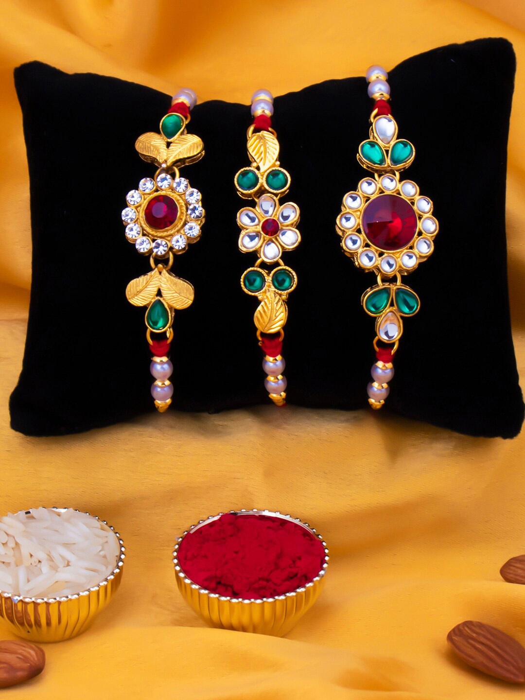 Sukkhi Rakhi Men Set Of 3 Gold-Plated Red & White Stone-Studded & Beaded Rakhi With Roli Chawal & Greeting Card
Sukkhi Rakhi Men Set Of 3 Gold-Plated Red & White Stone-Studded & Beaded Rakhi With Roli Chawal & Greeting Card