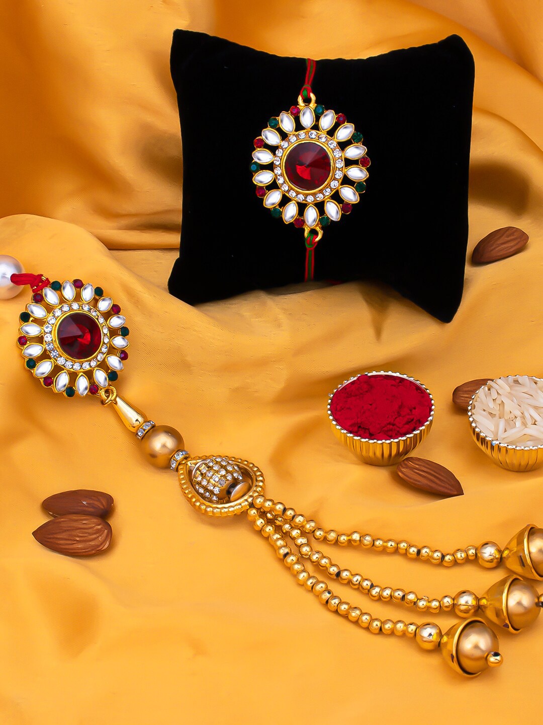 Sukkhi Rakhi Set Of 2 Red & White Stone-Studded Rakhi Lumba Set With Roli Chawal & Greeting Card, Gold
Sukkhi Rakhi Set Of 2 Red & White Stone-Studded Rakhi Lumba Set With Roli Chawal & Greeting Card, Gold