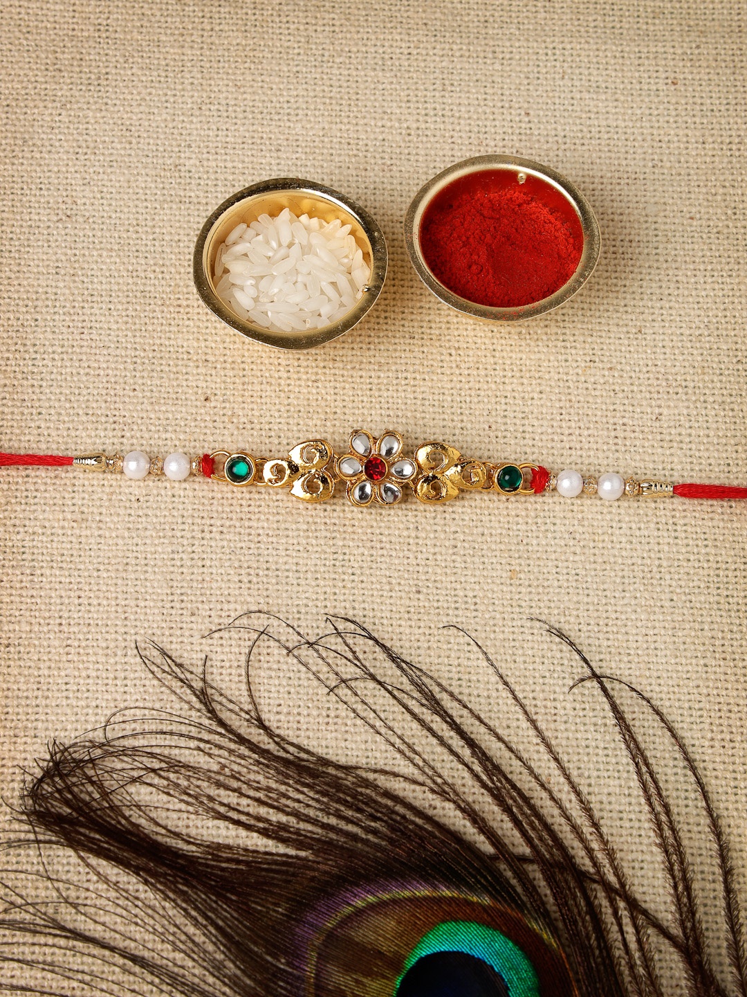Sukkhi Rakhi Unisex White & Red Stone-Studded Rakhi With Roli Chawal & Greeting Card, Gold
Sukkhi Rakhi Unisex White & Red Stone-Studded Rakhi With Roli Chawal & Greeting Card, Gold