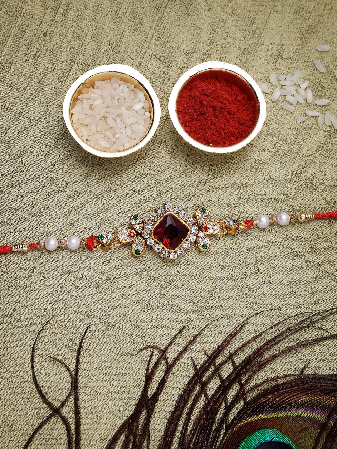 Sukkhi Rakhi Men Gold-Plated Red & White Stone-Studded Beaded Rakhi With Roli Chawal & Greeting Card
Sukkhi Rakhi Men Gold-Plated Red & White Stone-Studded Beaded Rakhi With Roli Chawal & Greeting Card