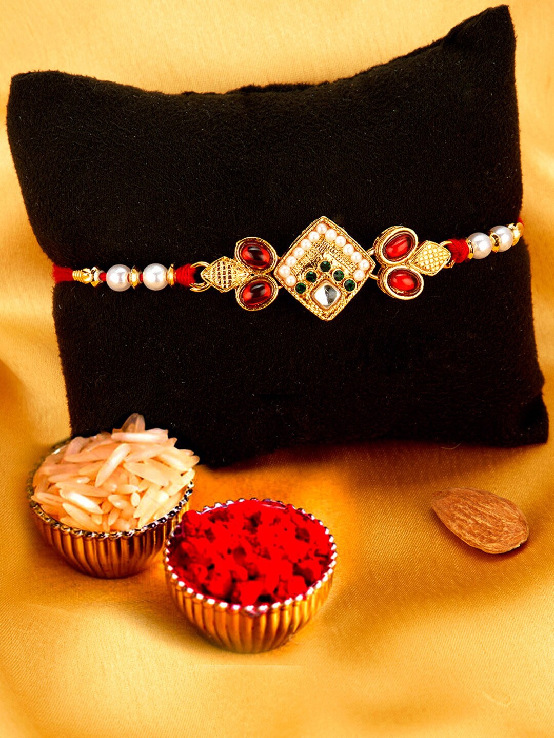 Sukkhi Rakhi Men Gold-Plated White & Red Stone-Studded & Beaded Rakhi With Roli Chawal & Greeting Card
Sukkhi Rakhi Men Gold-Plated White & Red Stone-Studded & Beaded Rakhi With Roli Chawal & Greeting Card