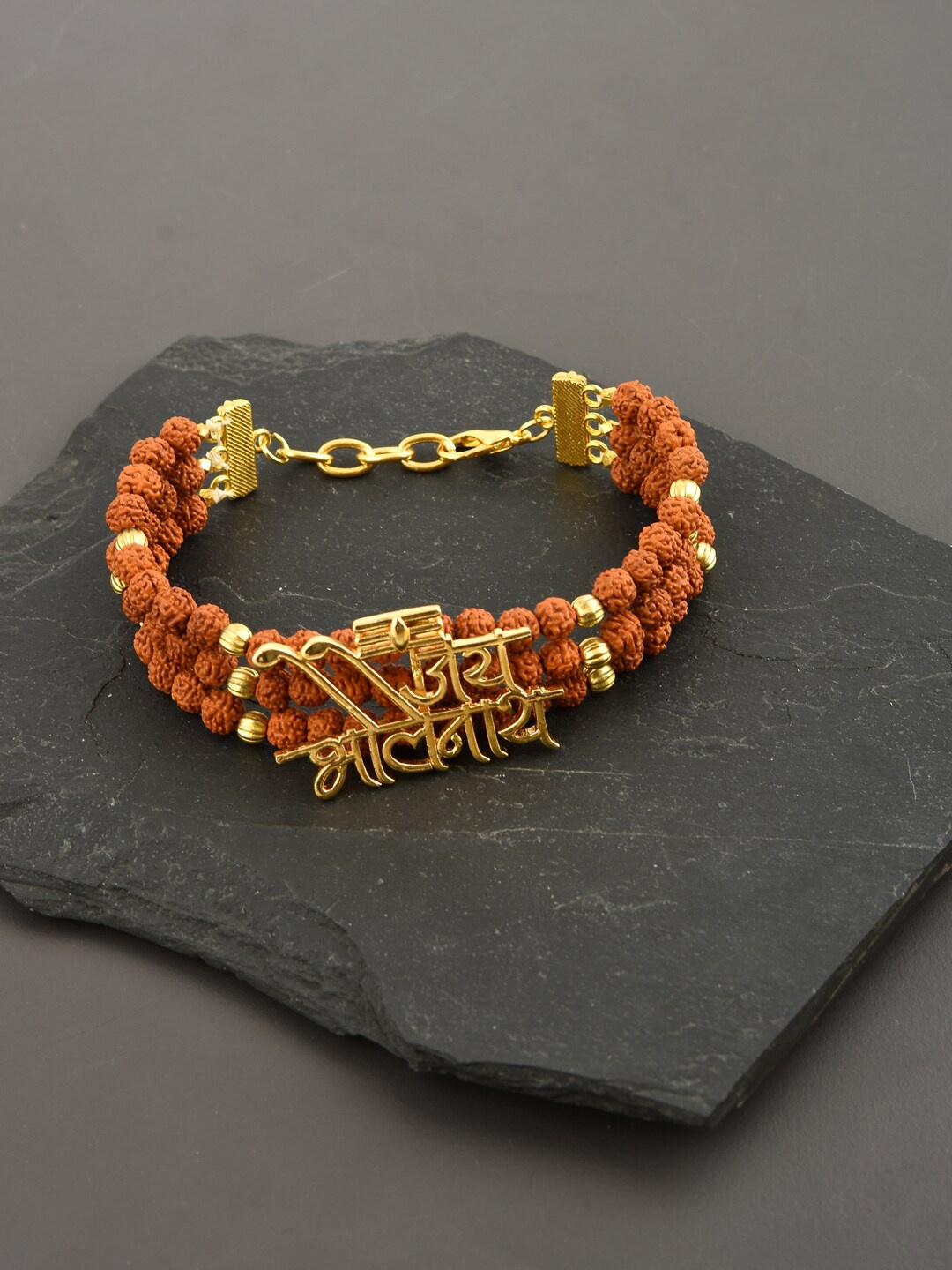 Tistabene Men Gold-Toned & Brown Gold-Plated Jai Bholenath Charm Bracelet
Tistabene Men Gold-Toned & Brown Gold-Plated Jai Bholenath Charm Bracelet