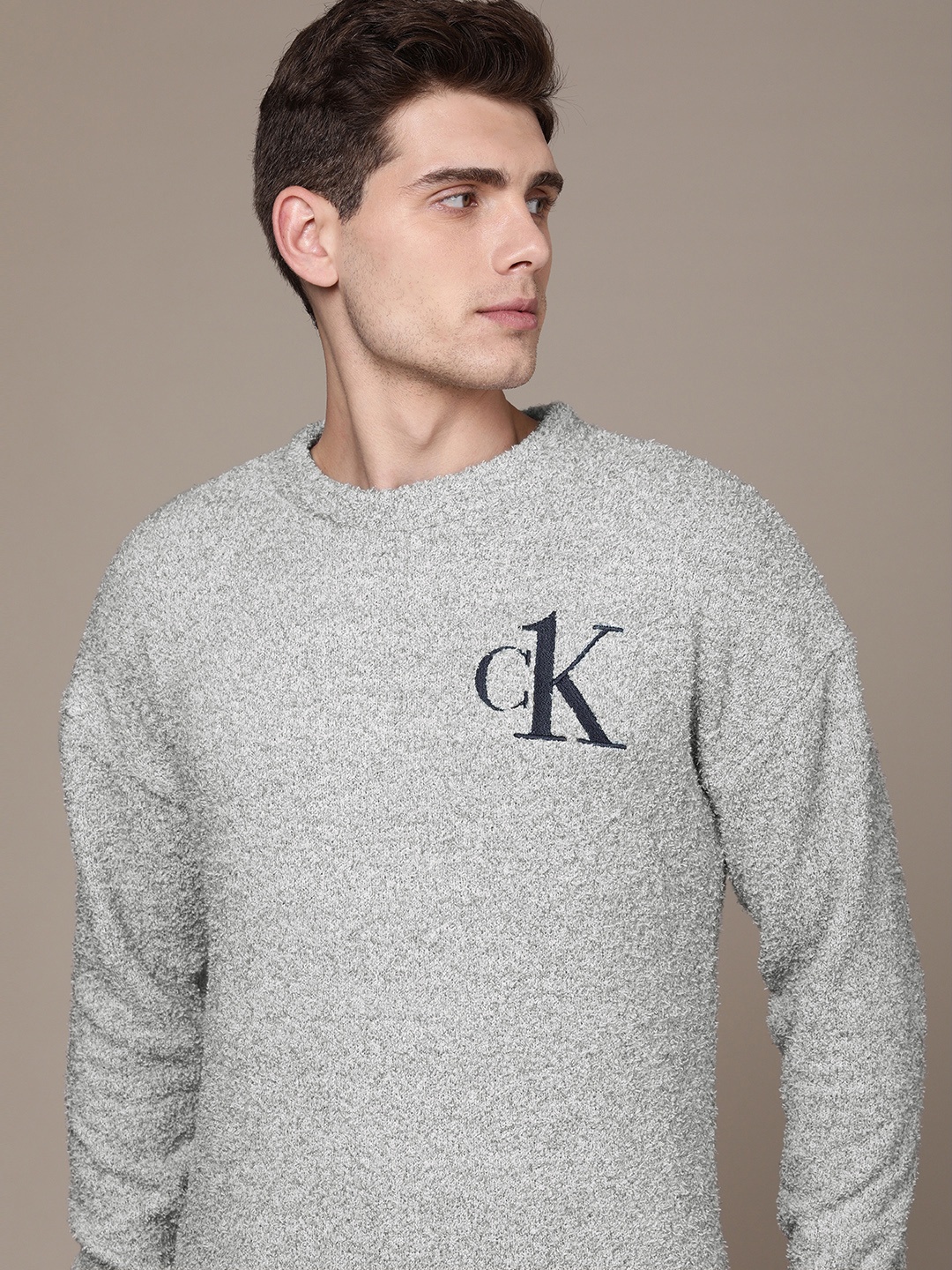 Calvin Klein Underwear Men Grey Melange Fleece Lounge Tshirt With Embroidered Detail
Calvin Klein Underwear Men Grey Melange Fleece Lounge Tshirt With Embroidered Detail