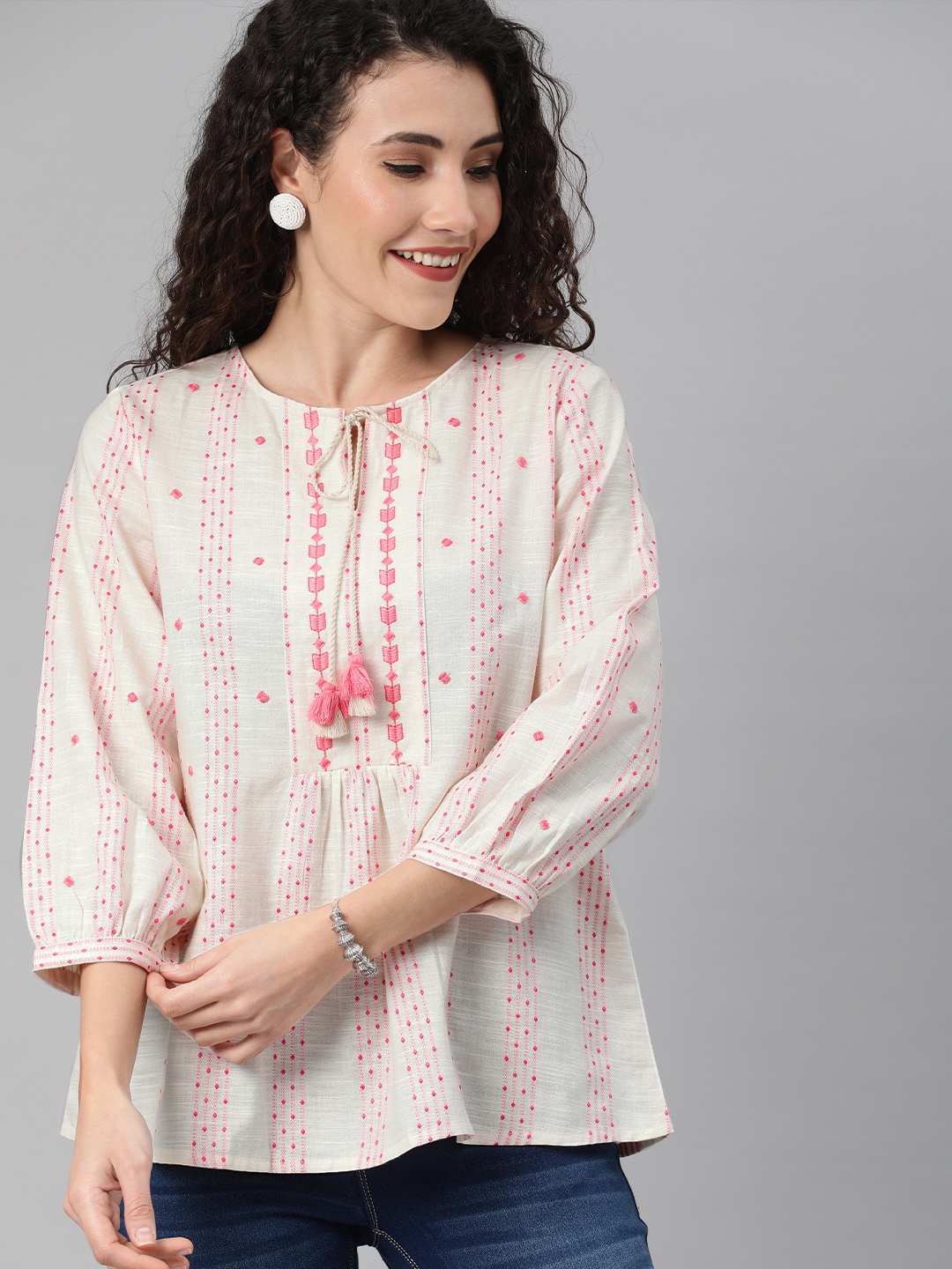 Global Desi Off-White & Pink Cotton Geometric Self-Design Tie-Up Neck A-Line Top
Global Desi Off-White & Pink Cotton Geometric Self-Design Tie-Up Neck A-Line Top
