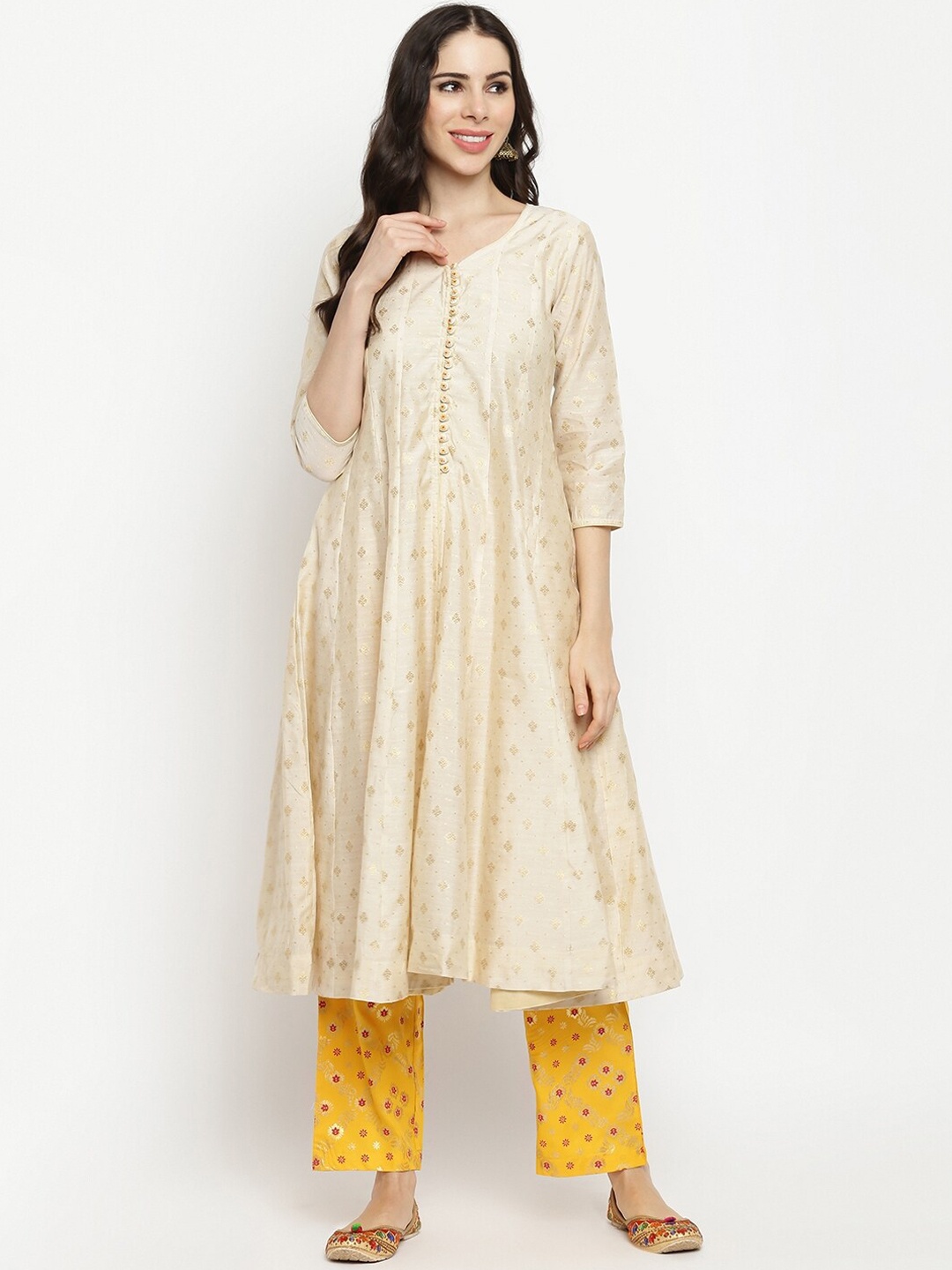 IMARA Women Off White & Yellow Ethnic Motifs Printed Chanderi Cotton Kurta with Trousers
IMARA Women Off White & Yellow Ethnic Motifs Printed Chanderi Cotton Kurta with Trousers