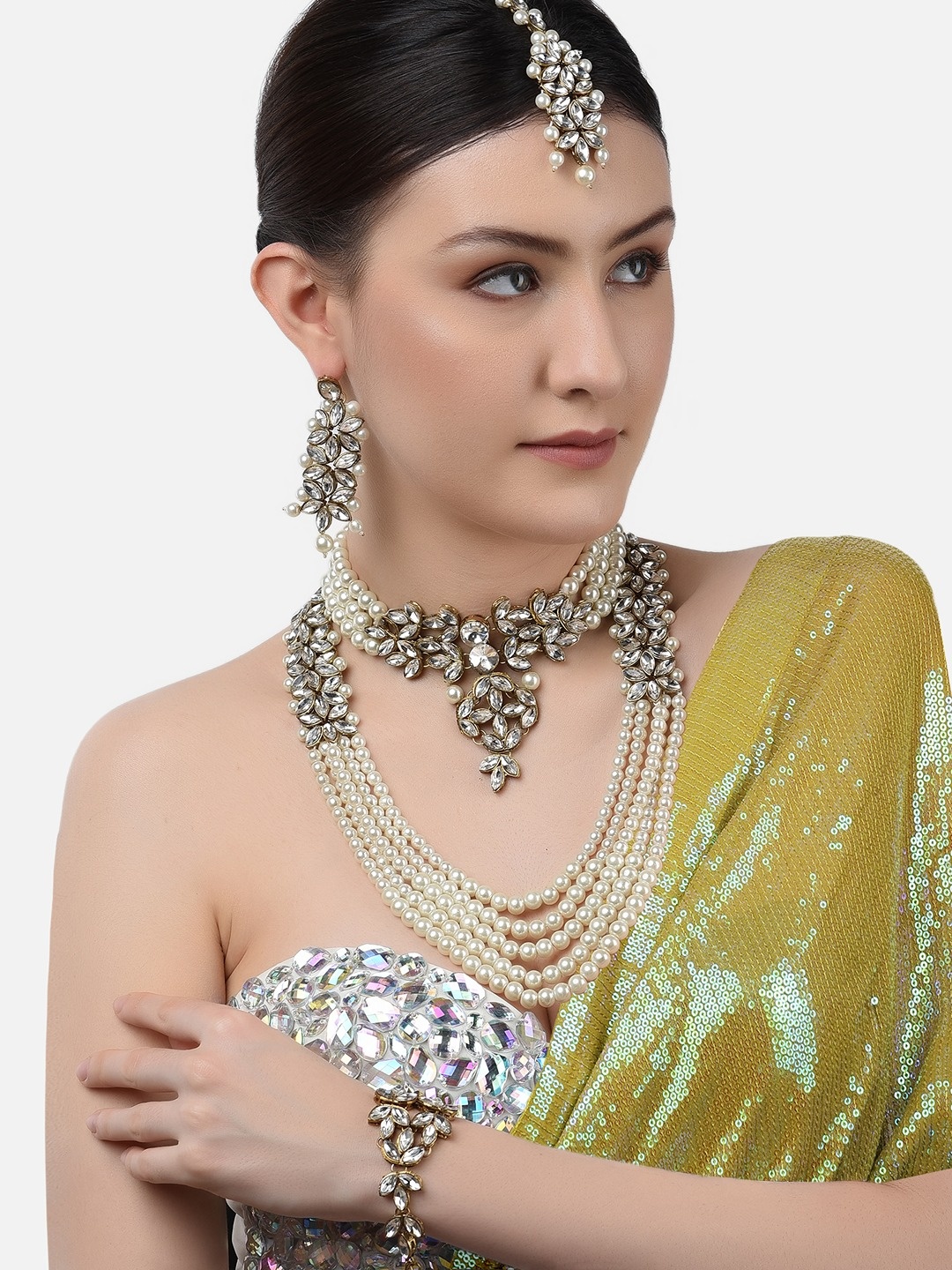 Zaveri Pearls Gold-Plated & White Stone-Studded & Pearl Beaded Multi-Layer & Strand Jewellery Set
Zaveri Pearls Gold-Plated & White Stone-Studded & Pearl Beaded Multi-Layer & Strand Jewellery Set