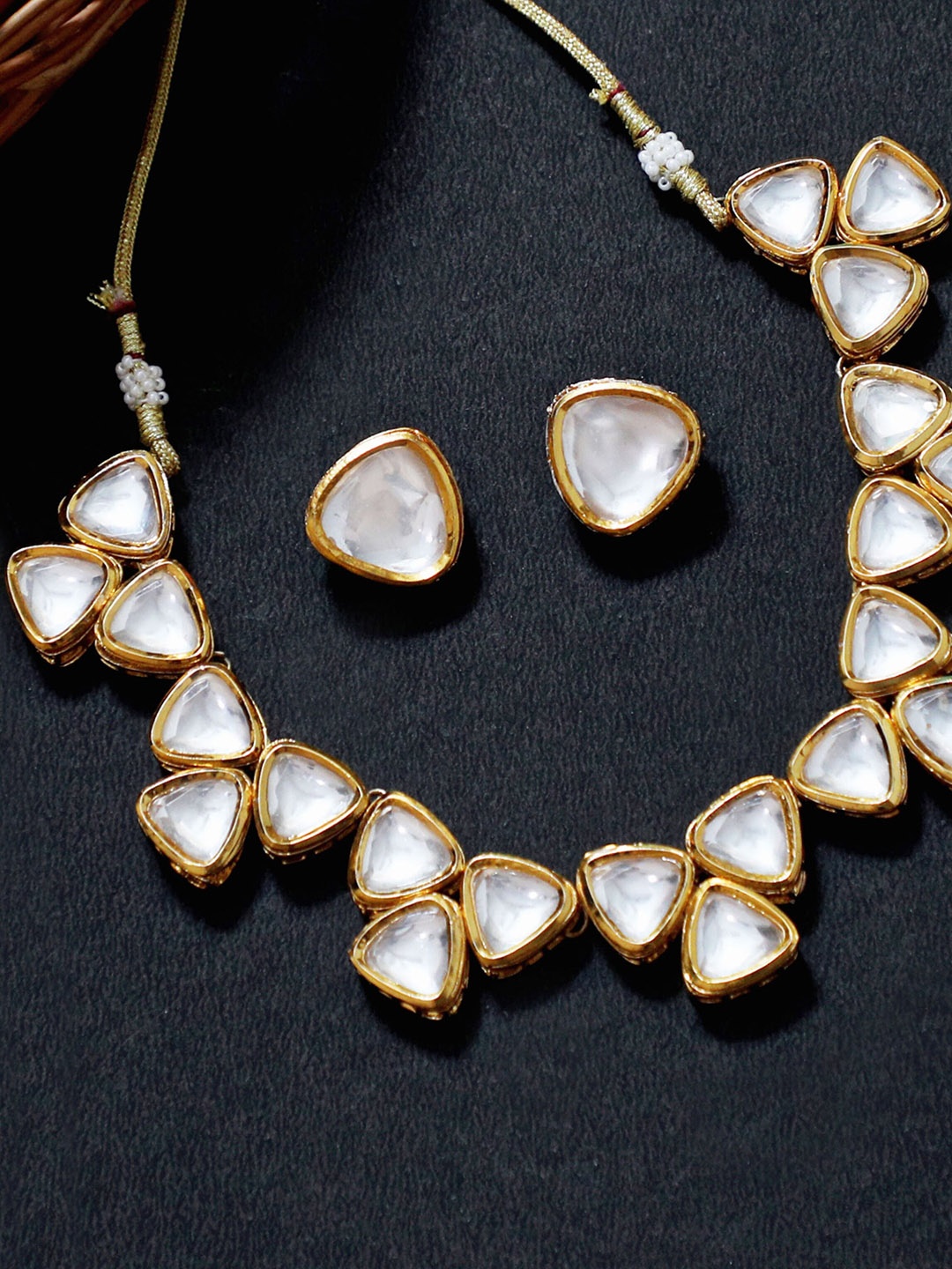 KARATCART Gold-Plated White Kundan-Studded Traditional Handcrafted Polki Jewellery Set
KARATCART Gold-Plated White Kundan-Studded Traditional Handcrafted Polki Jewellery Set