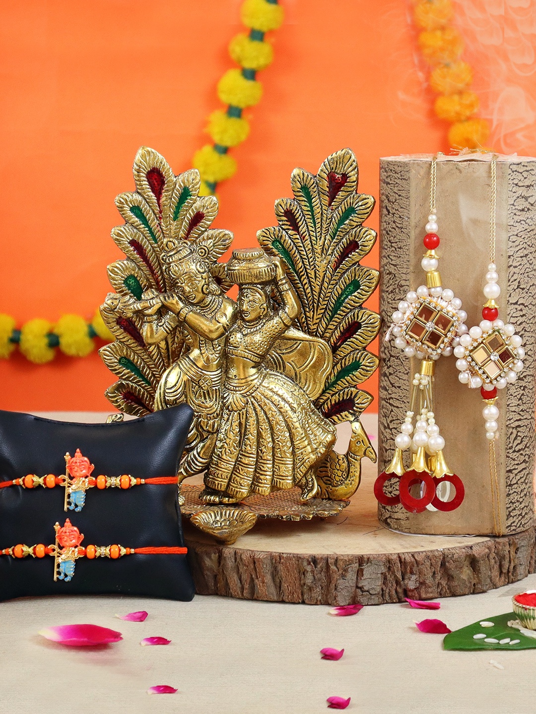 TIED RIBBONS Multicoloured Radha Krishna Idol Showpieces & Roli Chawal Rakhi Gift Set, Multi
TIED RIBBONS Multicoloured Radha Krishna Idol Showpieces & Roli Chawal Rakhi Gift Set, Multi