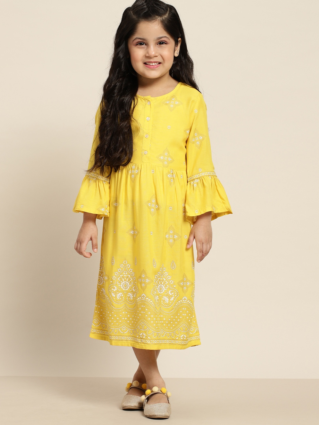 Sangria Girls Yellow & White Ethnic Motifs Printed Flared Sleeves Pleated Empire Dress
Sangria Girls Yellow & White Ethnic Motifs Printed Flared Sleeves Pleated Empire Dress