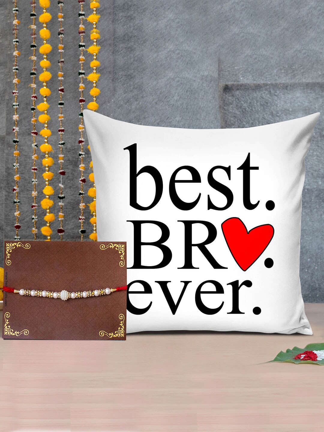 TIED RIBBONS Multicoloured Rakhi with Printed Cushion & Roli Chawal Combo Pack, Multi
TIED RIBBONS Multicoloured Rakhi with Printed Cushion & Roli Chawal Combo Pack, Multi