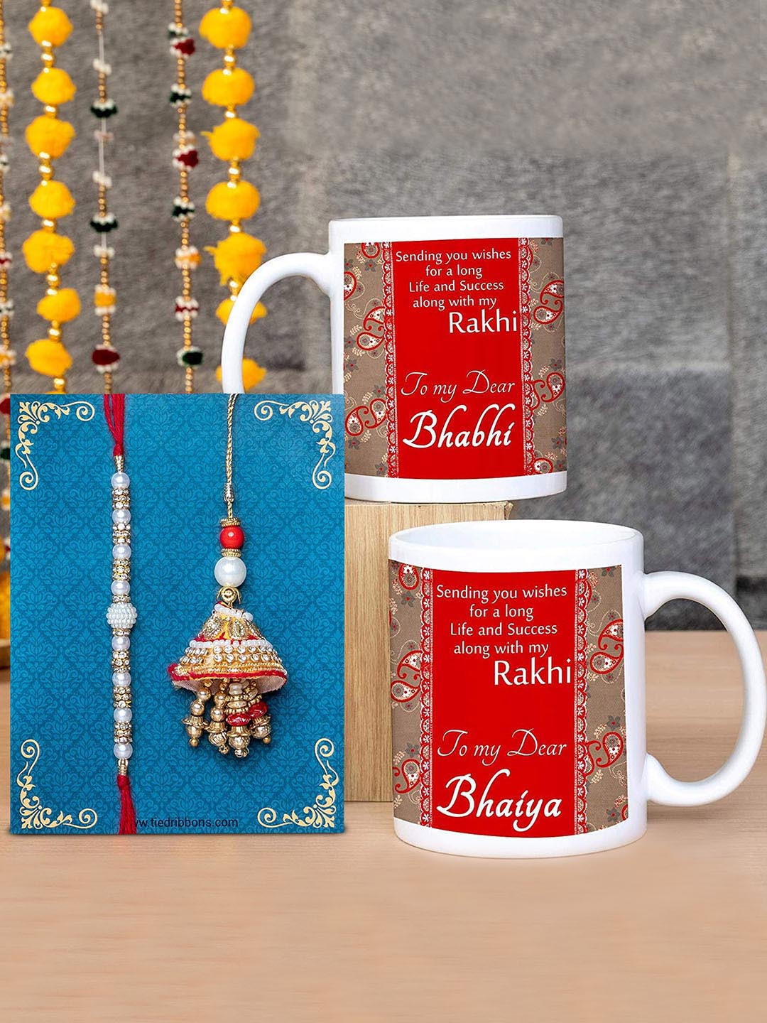 TIED RIBBONS Multicoloured Bhaiya Bhabhi Rakhi Set with Printed Coffee Mug Combo Gift Pack, Multi
TIED RIBBONS Multicoloured Bhaiya Bhabhi Rakhi Set with Printed Coffee Mug Combo Gift Pack, Multi