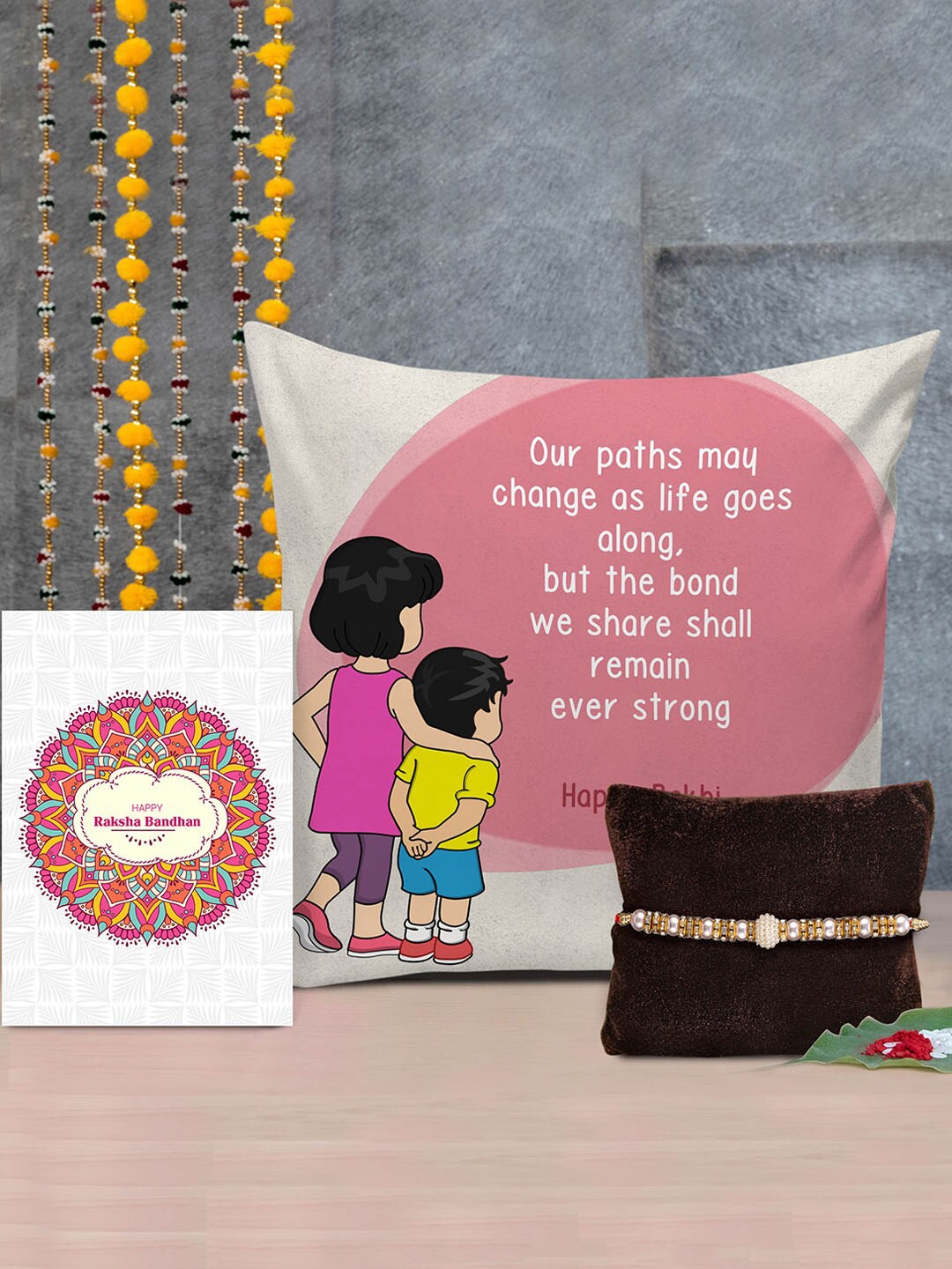 TIED RIBBONS Multicoloured Designer Rakhi with Printed Cushion & Roli Chawal Gift Pack, Multi
TIED RIBBONS Multicoloured Designer Rakhi with Printed Cushion & Roli Chawal Gift Pack, Multi