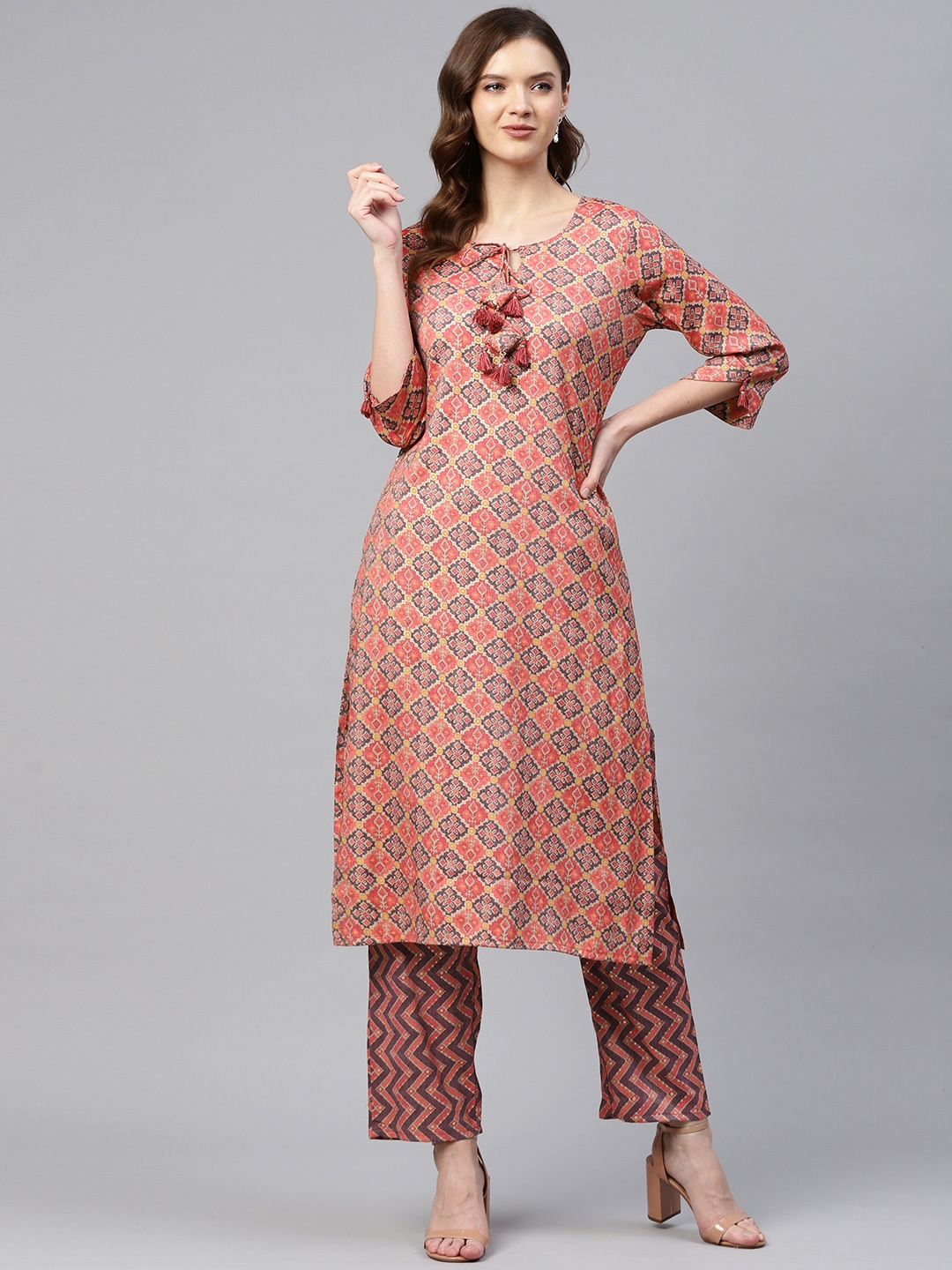 Readiprint Fashions Women Peach & Gold Ikat Woven Design Straight Kurta with Palazzos
Readiprint Fashions Women Peach & Gold Ikat Woven Design Straight Kurta with Palazzos