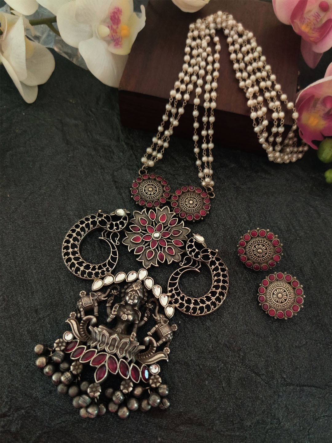 Binnis Wardrobe Silver-Toned & Maroon German Silver Oxidised Antique Temple Jewellery Set
Binnis Wardrobe Silver-Toned & Maroon German Silver Oxidised Antique Temple Jewellery Set