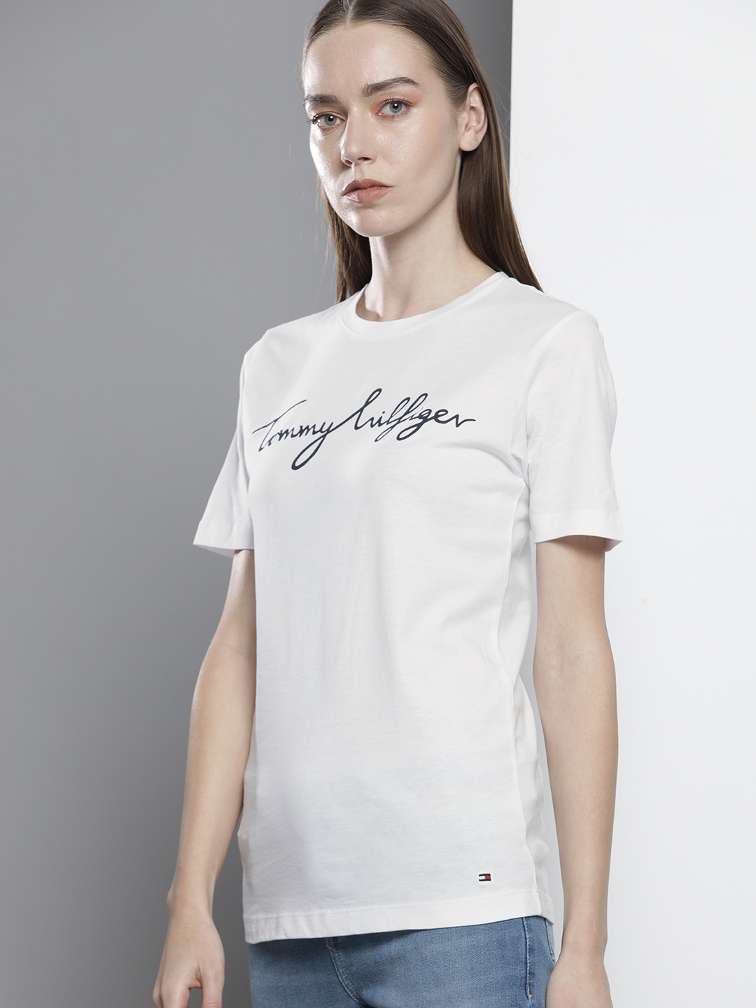 Tommy Hilfiger Women White Typography Printed Organic Cotton Slim Fit Organic Cotton T-shirt
Tommy Hilfiger Women White Typography Printed Organic Cotton Slim Fit Organic Cotton T-shirt