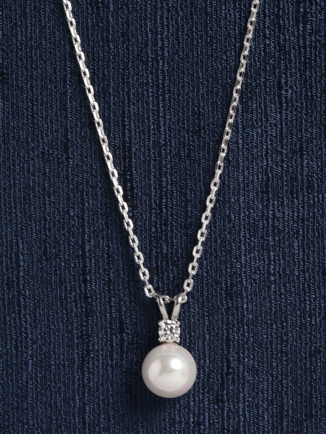 Clara Rhodium-Plated Silver-Toned & White CZ-Studded & Pearl Beaded Pendant With Chain
Clara Rhodium-Plated Silver-Toned & White CZ-Studded & Pearl Beaded Pendant With Chain