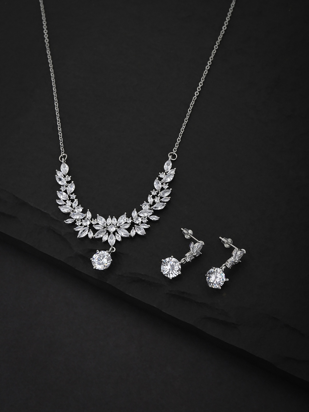Carlton London Silver-Toned Rhodium-Plated Floral Handcrafted CZ-Studded Jewellery Set
Carlton London Silver-Toned Rhodium-Plated Floral Handcrafted CZ-Studded Jewellery Set