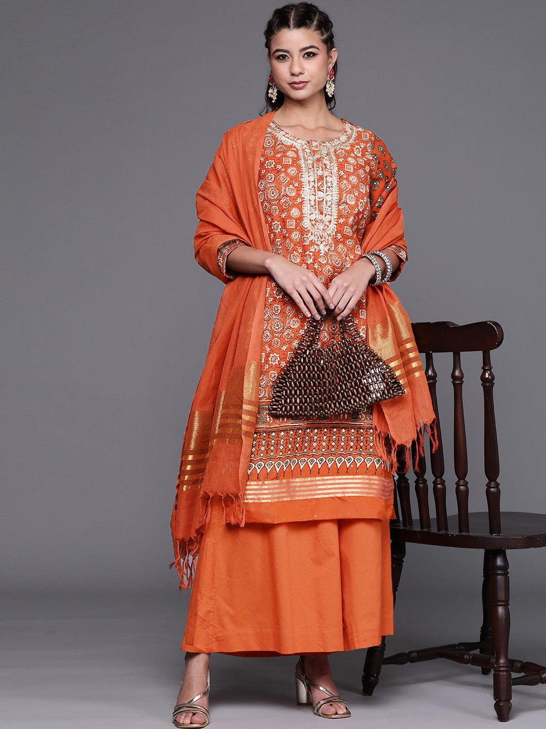 Biba Women Orange & Off-White Motifs Printed Sequinned Kurta with Palazzos & Dupatta
Biba Women Orange & Off-White Motifs Printed Sequinned Kurta with Palazzos & Dupatta