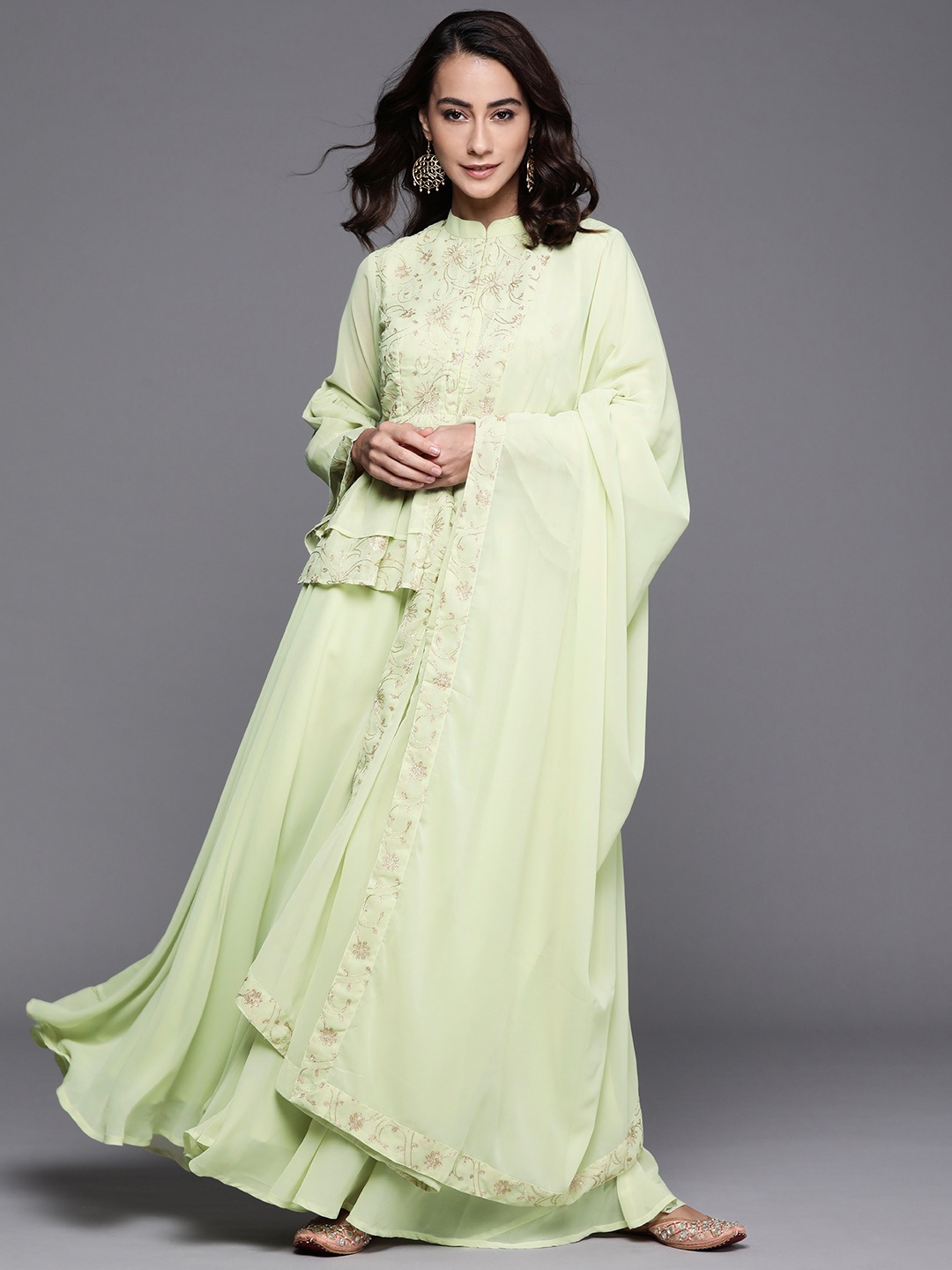 Libas Women Floral Motifs Embroidered Thread Work Peplum Top with Palazzos & Dupatta, Green
Libas Women Floral Motifs Embroidered Thread Work Peplum Top with Palazzos & Dupatta, Green