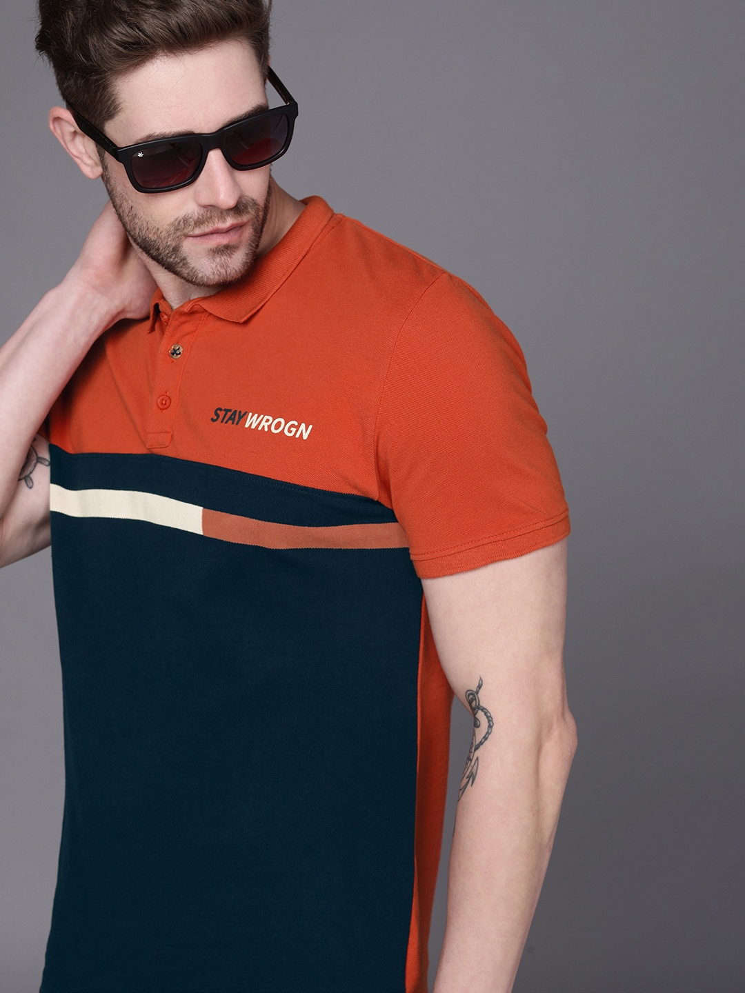 WROGN Men Navy Blue Rust Orange Colourblocked Polo Collar Slim Fit Pure Cotton T-shirt
WROGN Men Navy Blue Rust Orange Colourblocked Polo Collar Slim Fit Pure Cotton T-shirt