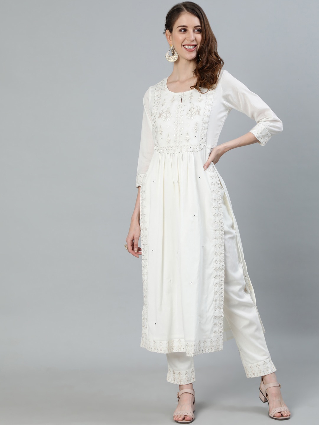 Ishin Women Off White Ethnic Motifs Embroidered High Slit Thread Work Pure Cotton Kurta with Trousers
Ishin Women Off White Ethnic Motifs Embroidered High Slit Thread Work Pure Cotton Kurta with Trousers