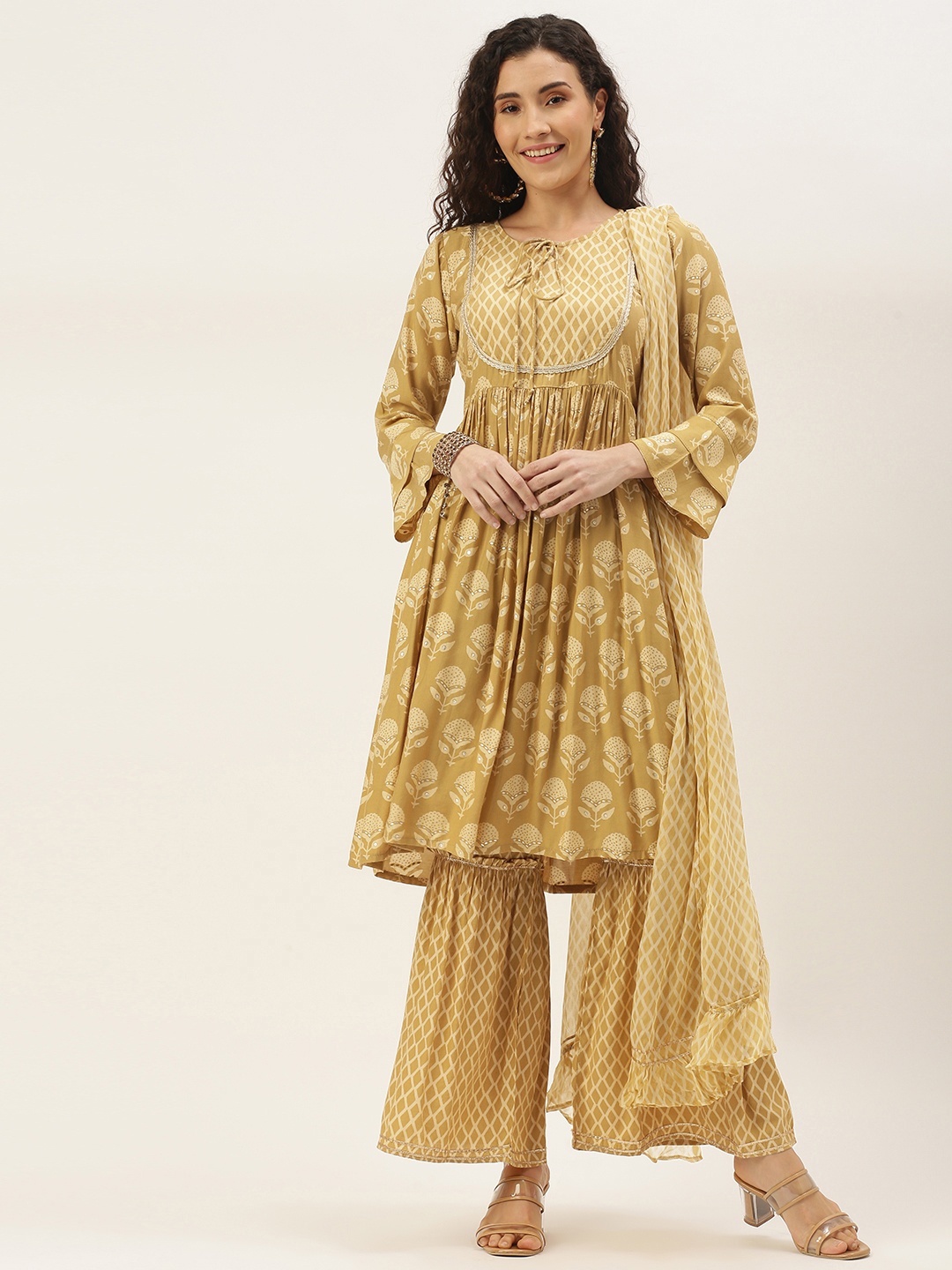 VAABA Women Beige & Cream-Coloured Ethnic Motifs Screen Print Kurta with Sharara & Dupatta
VAABA Women Beige & Cream-Coloured Ethnic Motifs Screen Print Kurta with Sharara & Dupatta