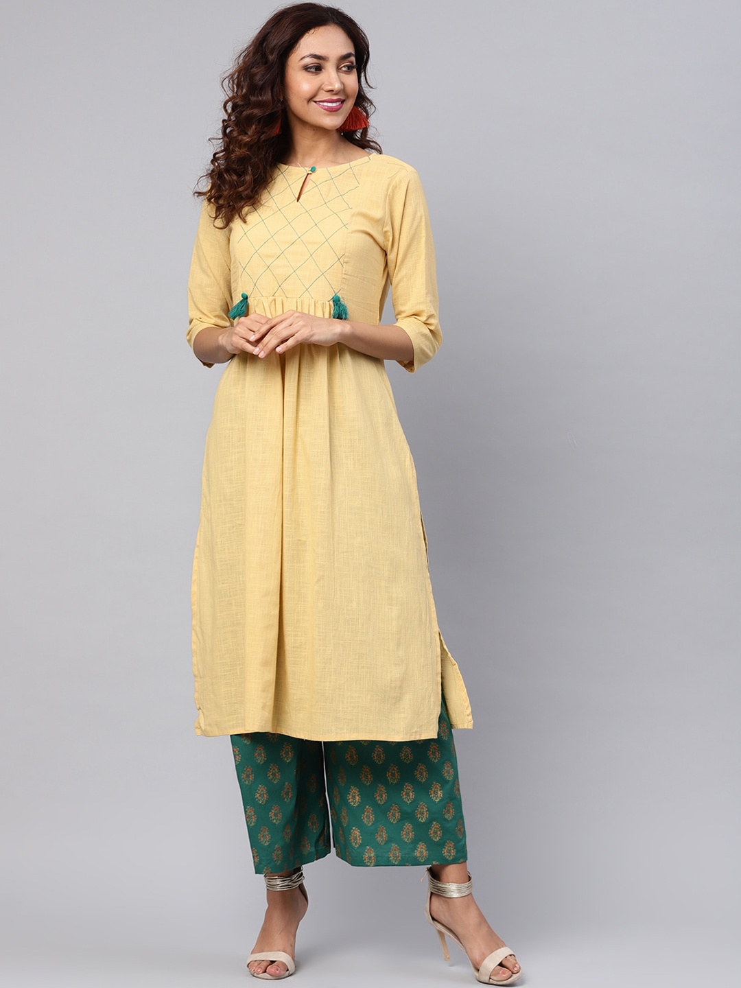 Idalia Women Beige & Green Yoke Design Pleated Thread Work Pure Cotton Kurta with Palazzos
Idalia Women Beige & Green Yoke Design Pleated Thread Work Pure Cotton Kurta with Palazzos