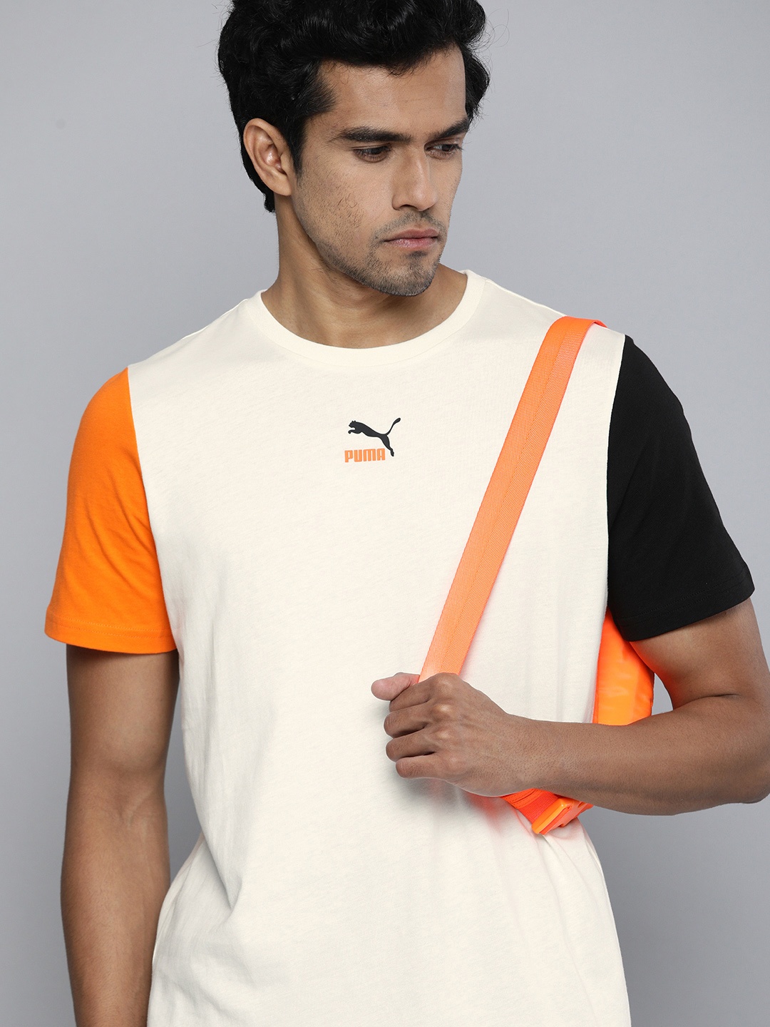 Puma Men Cream-Coloured & Orange Brand Logo Printed Pure Cotton Round Neck T-shirt
Puma Men Cream-Coloured & Orange Brand Logo Printed Pure Cotton Round Neck T-shirt