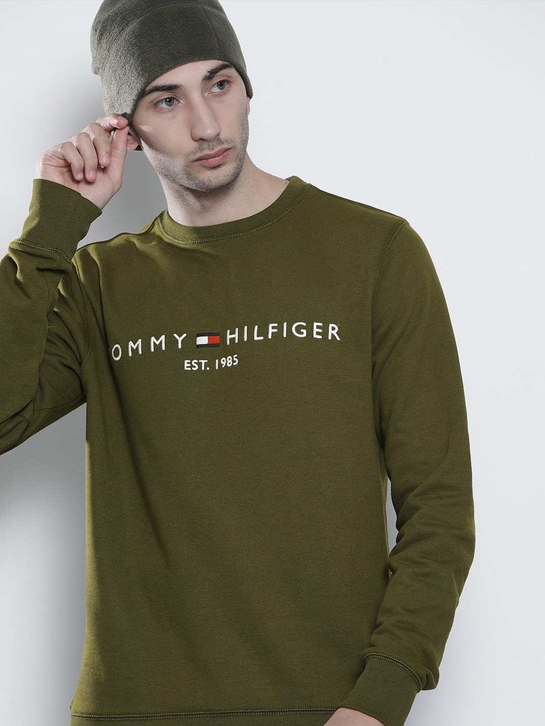 Tommy Hilfiger Men Olive Green & White Pure Cotton Brand Logo Embroidered Sweatshirt
Tommy Hilfiger Men Olive Green & White Pure Cotton Brand Logo Embroidered Sweatshirt