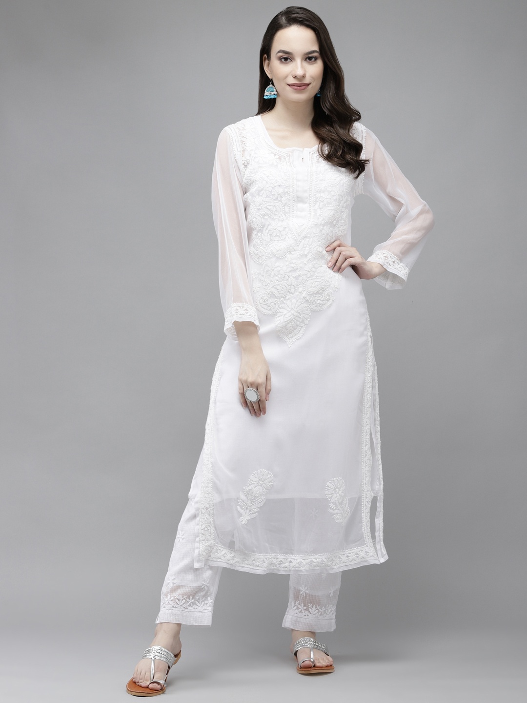 ADA Women White Ethnic Motifs Embroidered Chikankari Georgette Handloom Kurta with a Matching Slip
ADA Women White Ethnic Motifs Embroidered Chikankari Georgette Handloom Kurta with a Matching Slip