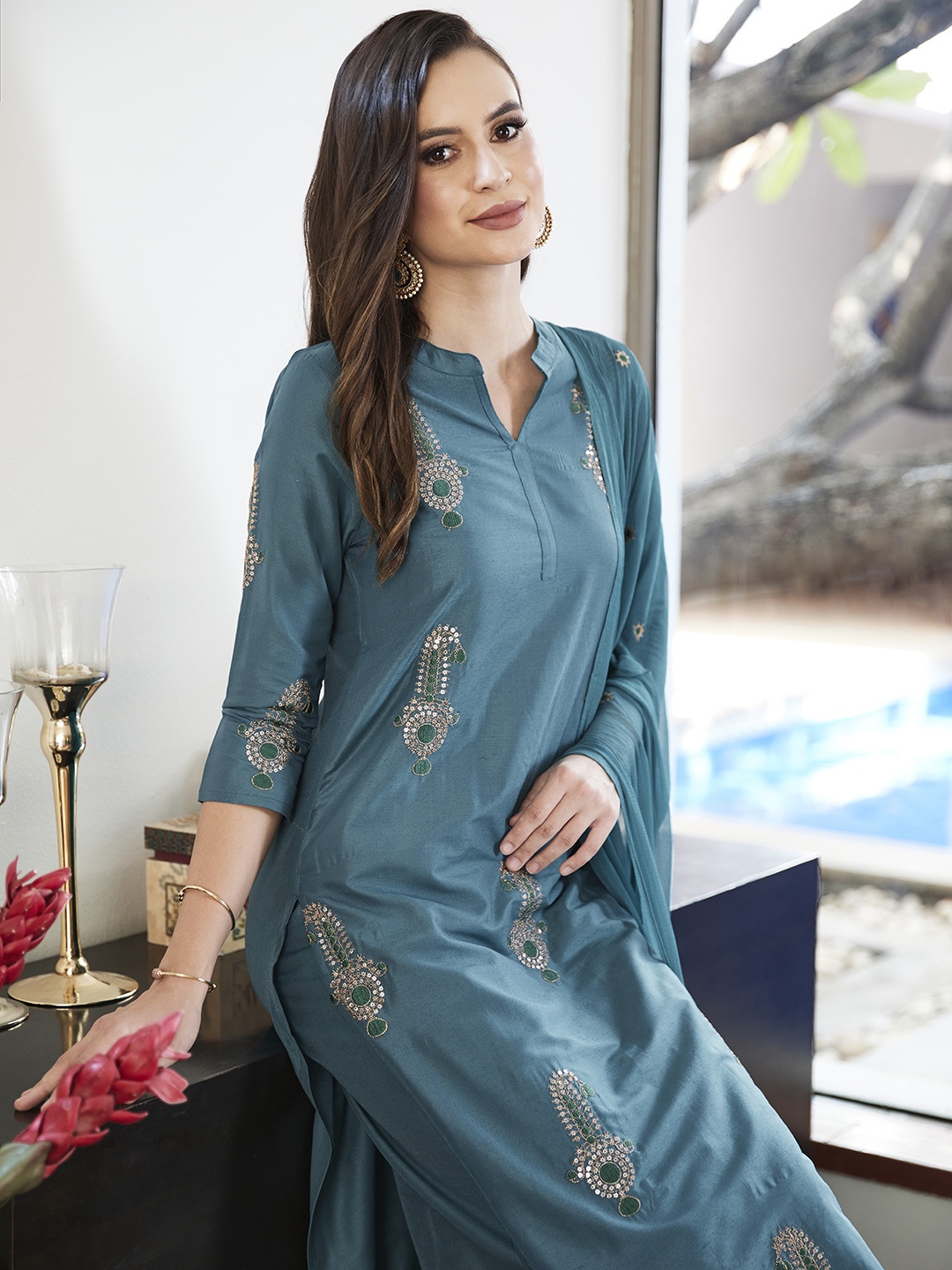 House of Pataudi Women Teal Embroidered Jashn Kurta with Palazzos & Dupatta
House of Pataudi Women Teal Embroidered Jashn Kurta with Palazzos & Dupatta