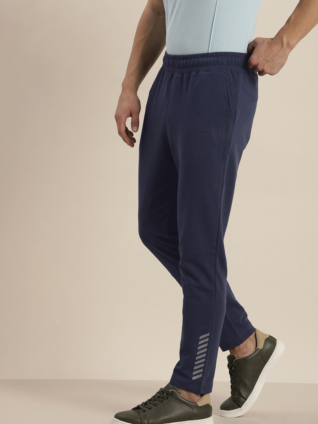 Invictus Indoor Men Navy Blue Solid Knitted Track Pants with Brand Logo Applique Detail
Invictus Indoor Men Navy Blue Solid Knitted Track Pants with Brand Logo Applique Detail