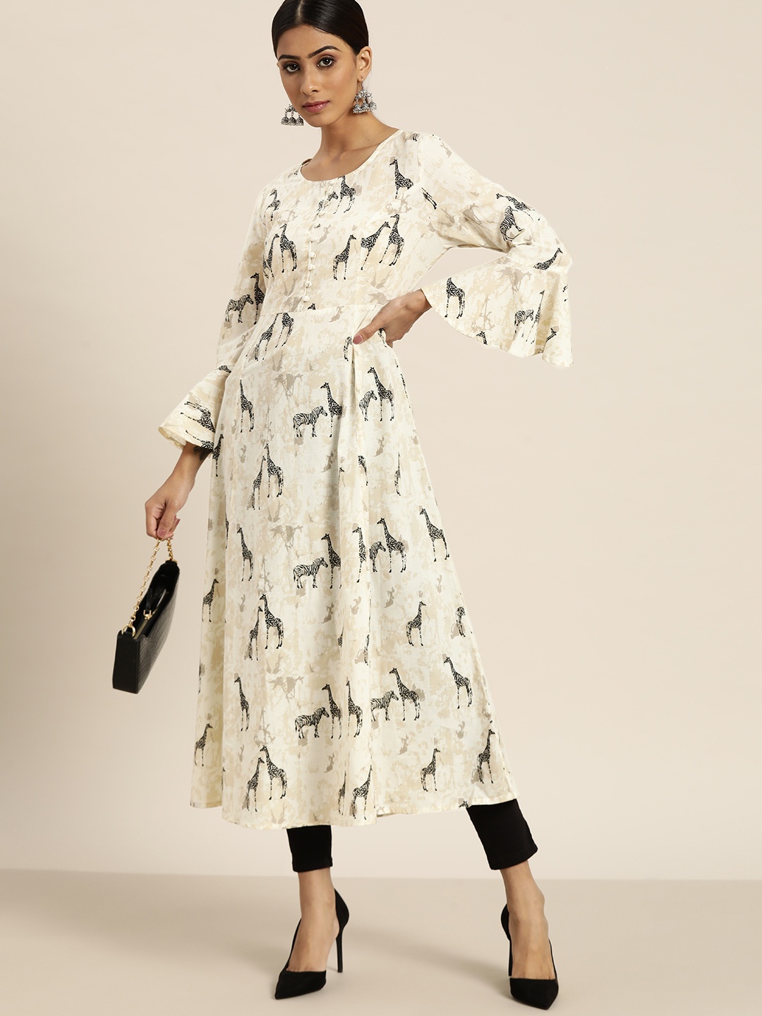 Moda Rapido Women Off White & Black Quirky Printed Pure Cotton Bell Sleeves Kurta
Moda Rapido Women Off White & Black Quirky Printed Pure Cotton Bell Sleeves Kurta