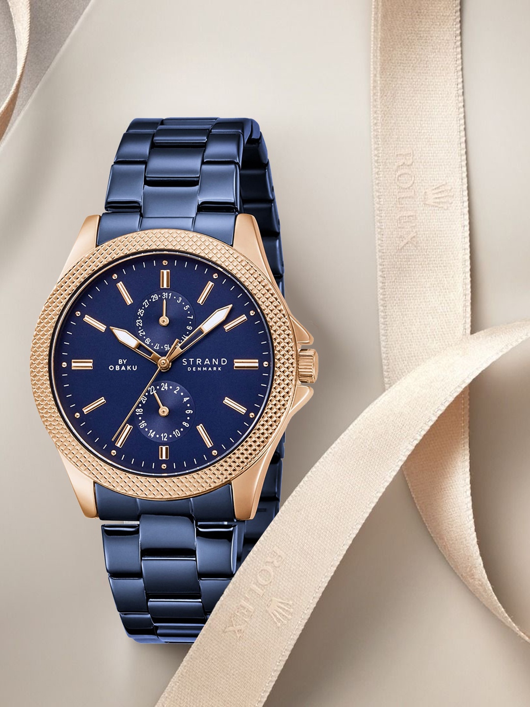 STRAND BY OBAKU Men Blue Brass Embellished Dial & Blue Straps Analogue Watch S710GMVLSL
STRAND BY OBAKU Men Blue Brass Embellished Dial & Blue Straps Analogue Watch S710GMVLSL