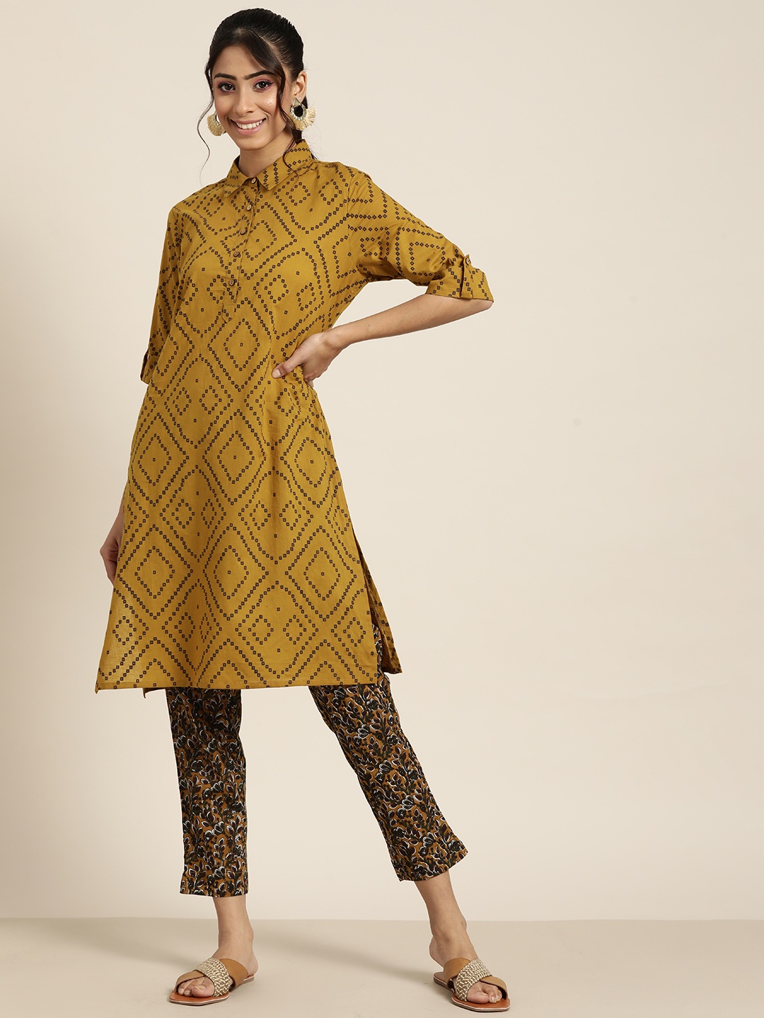 Sangria Women Mustard Yellow & Coffee Brown Bandhani Print Cotton Kurta with Crop Trousers
Sangria Women Mustard Yellow & Coffee Brown Bandhani Print Cotton Kurta with Crop Trousers