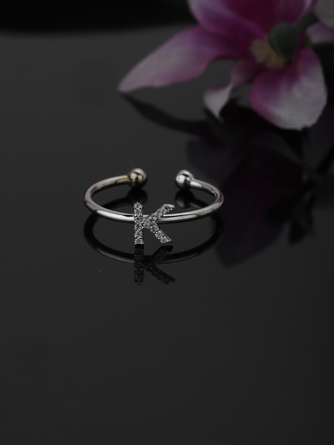 Carlton London Rhodium-Plated CZ-Studded Handcrafted Adjustable Alphabet Finger Ring, Silver
Carlton London Rhodium-Plated CZ-Studded Handcrafted Adjustable Alphabet Finger Ring, Silver