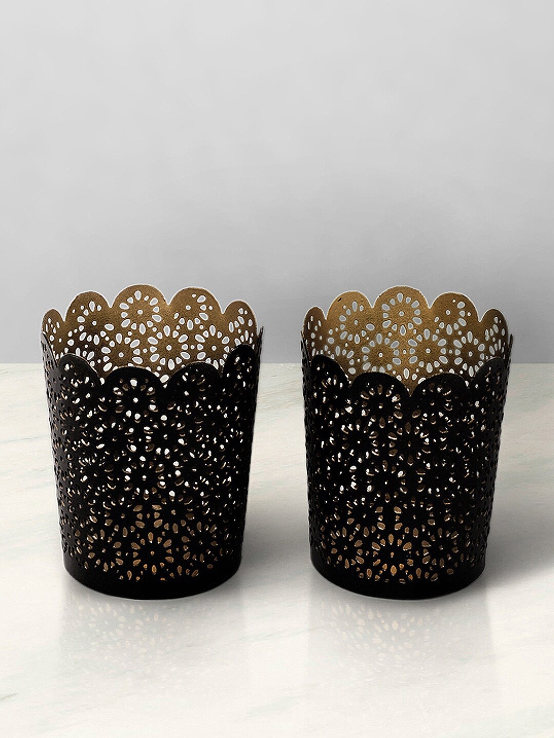 Living scapes by Pantaloons Set of 2 Black Textured Flower Cut Metal Votive Candle Holder
Living scapes by Pantaloons Set of 2 Black Textured Flower Cut Metal Votive Candle Holder