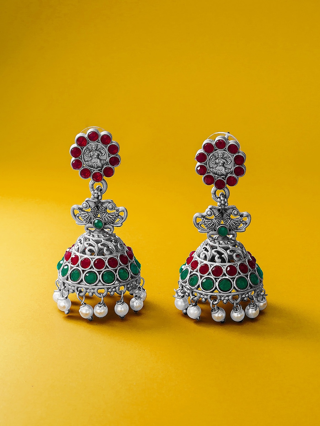 aadita Women Silver-Toned Red & Green Stone Studded & pear beaded Classic Jhumkas Earrings
aadita Women Silver-Toned Red & Green Stone Studded & pear beaded Classic Jhumkas Earrings