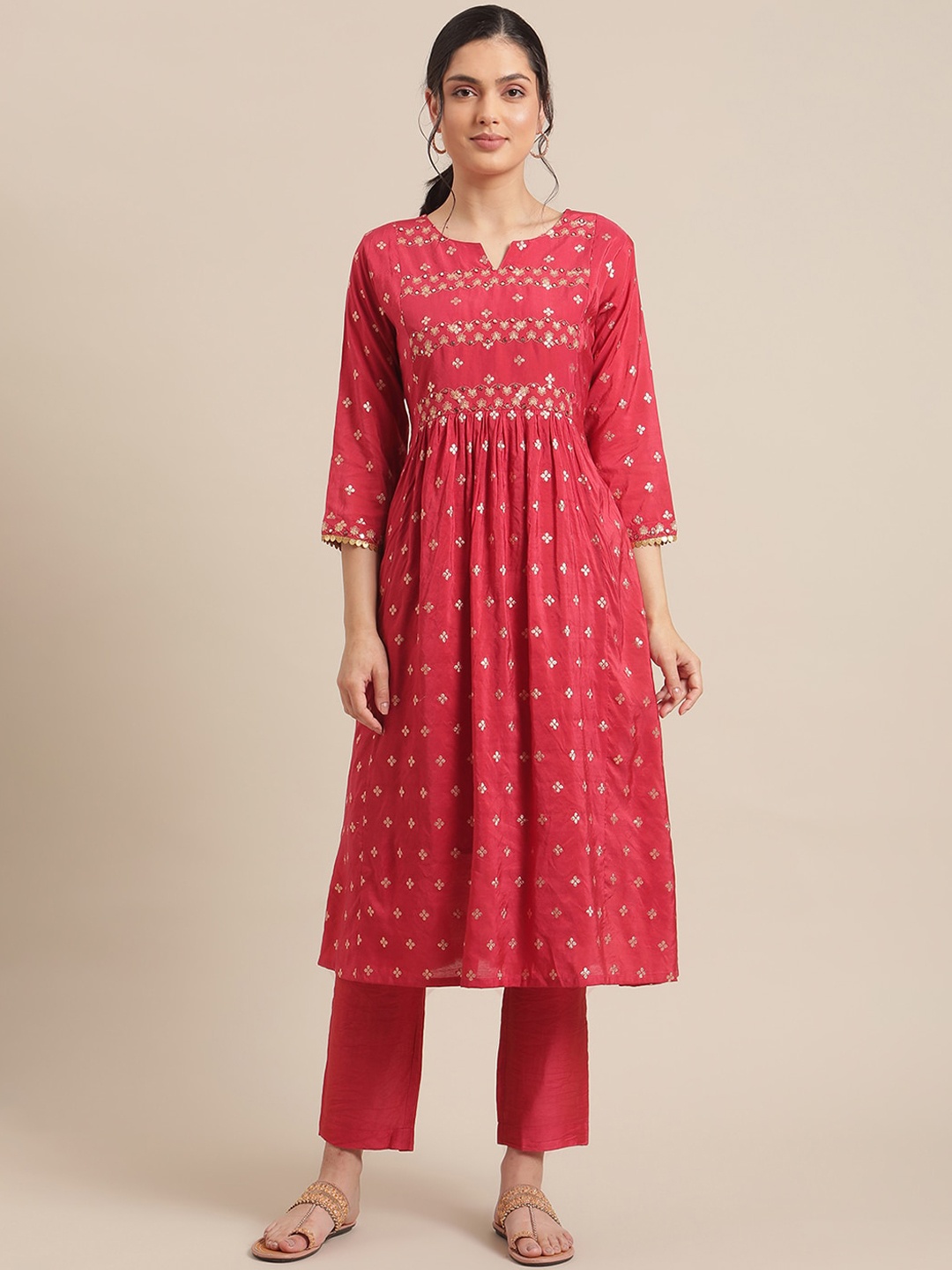 Varanga Women Red & Gold-Toned Floral Embroidered Mirror Work Pleated Kurta With Trousers
Varanga Women Red & Gold-Toned Floral Embroidered Mirror Work Pleated Kurta With Trousers