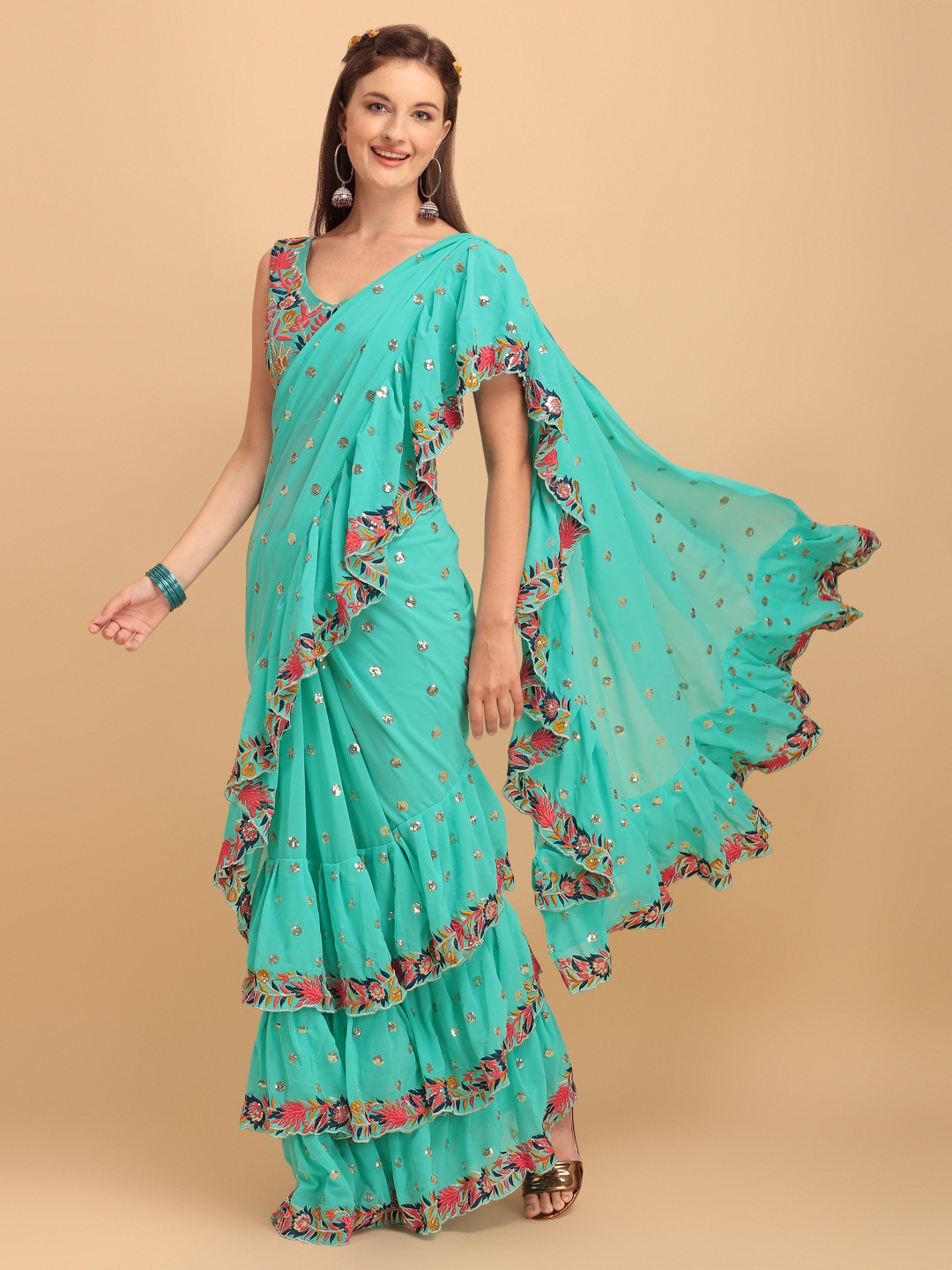 JATRIQQ Turquoise Blue & Orange Embellished Embroidered Ruffles Pure Georgette Saree
JATRIQQ Turquoise Blue & Orange Embellished Embroidered Ruffles Pure Georgette Saree