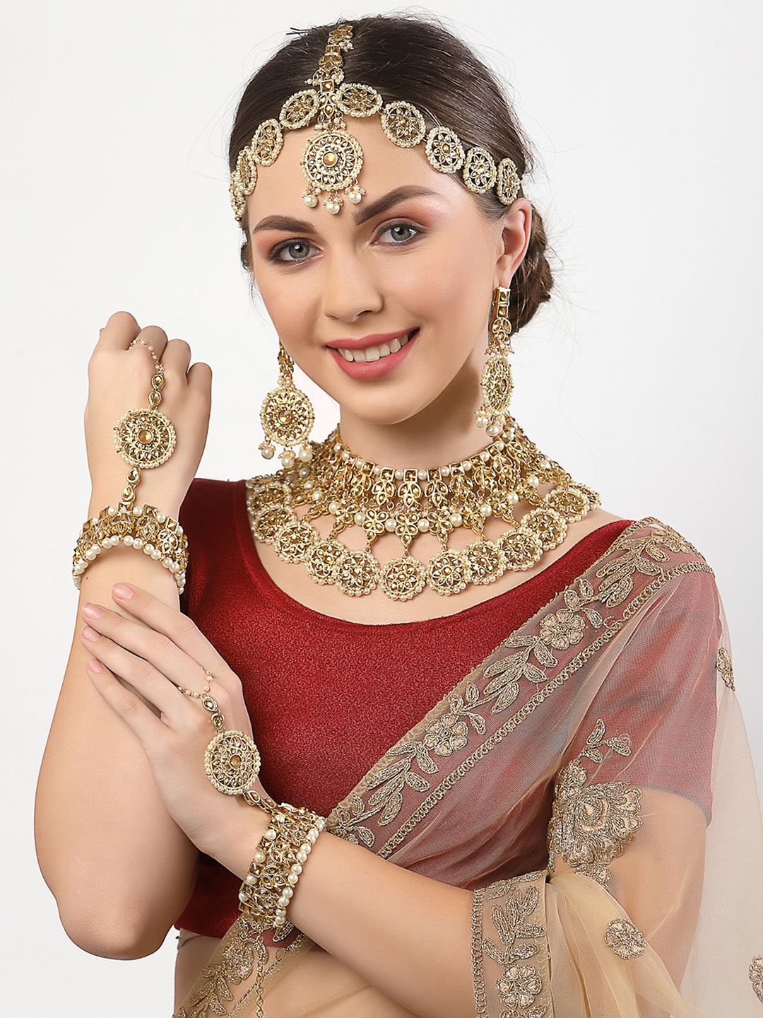 KARATCART Gold-Plated Brown Kundan-Studded & White Pearl Beaded Handcrafted Jewellery Set
KARATCART Gold-Plated Brown Kundan-Studded & White Pearl Beaded Handcrafted Jewellery Set