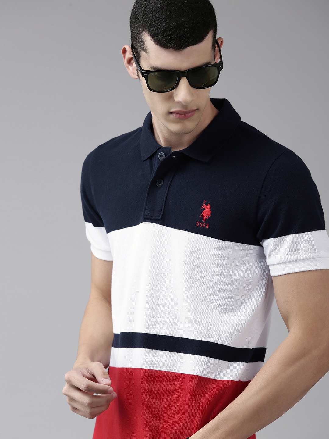 U S Polo Assn Men Navy Blue & White Colourblocked Polo Collar Slim Fit Pure Cotton T-shirt
U S Polo Assn Men Navy Blue & White Colourblocked Polo Collar Slim Fit Pure Cotton T-shirt