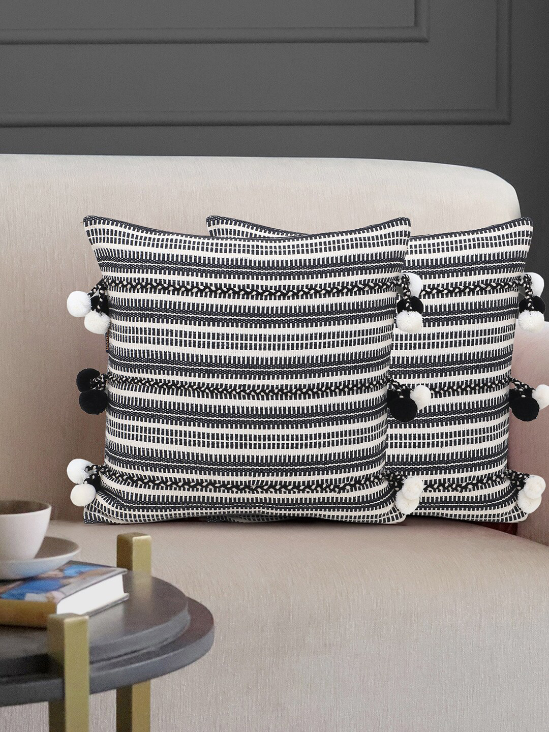 Mezposh Set of 2 Off White & Black Jacquard Striped Square Pompoms Cushion Covers
Mezposh Set of 2 Off White & Black Jacquard Striped Square Pompoms Cushion Covers