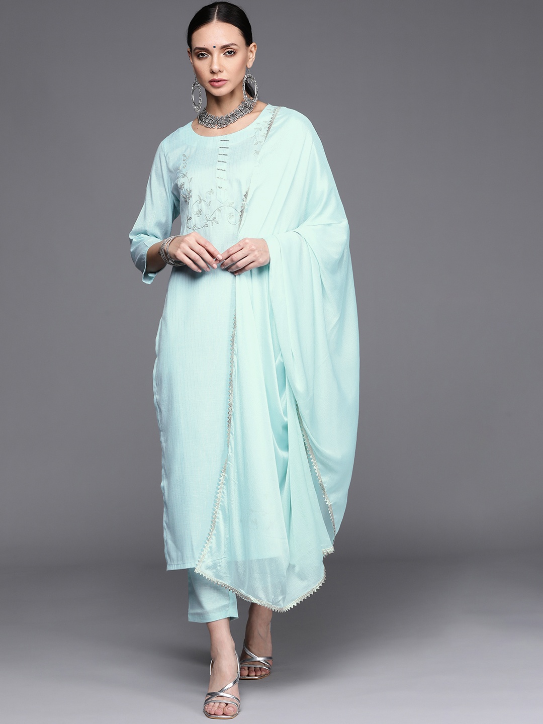 Libas Women Blue & Silver Striped Thread Work Cotton Kurta with Trousers & With Dupatta
Libas Women Blue & Silver Striped Thread Work Cotton Kurta with Trousers & With Dupatta