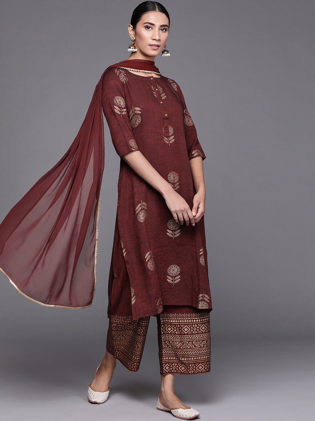 Libas Women Maroon Floral Printed Regular Chanderi Silk Kurta with Palazzos & Dupatta
Libas Women Maroon Floral Printed Regular Chanderi Silk Kurta with Palazzos & Dupatta