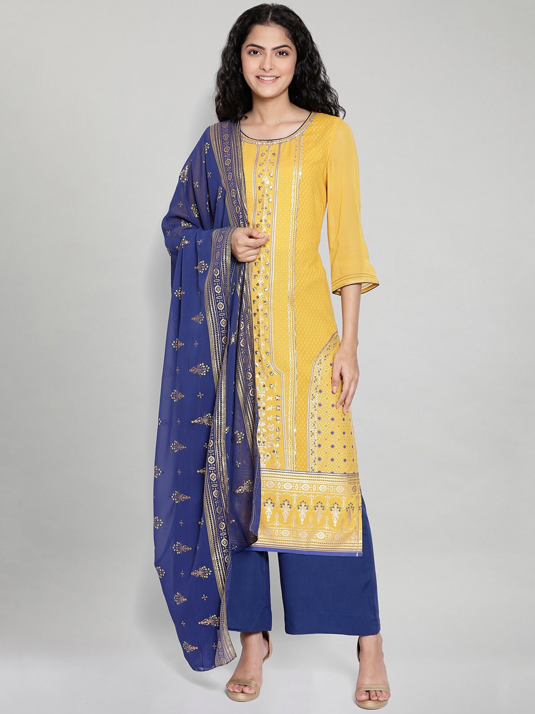 AURELIA Women Yellow & Navy blue Ethnic Motifs Printed Kurta with Trousers & With Dupatta
AURELIA Women Yellow & Navy blue Ethnic Motifs Printed Kurta with Trousers & With Dupatta