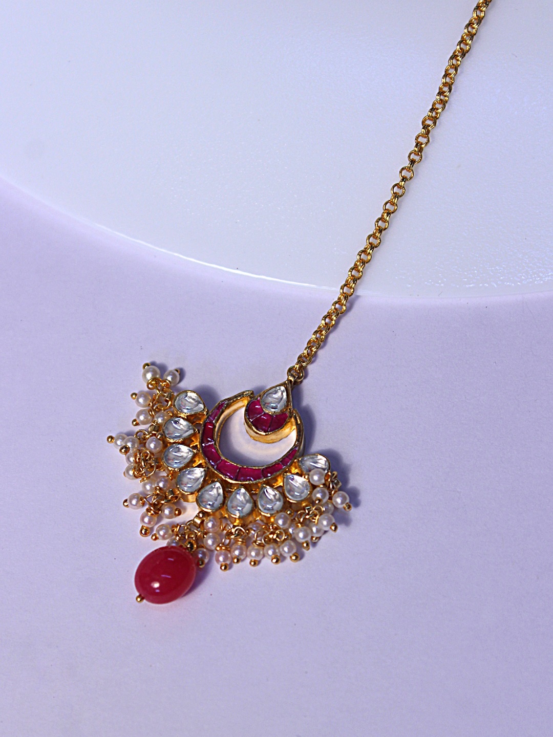 AccessHer Oxidised Gold-Plated White & Red Kundan-Studded & Pearl Beaded Maang Tikka
AccessHer Oxidised Gold-Plated White & Red Kundan-Studded & Pearl Beaded Maang Tikka