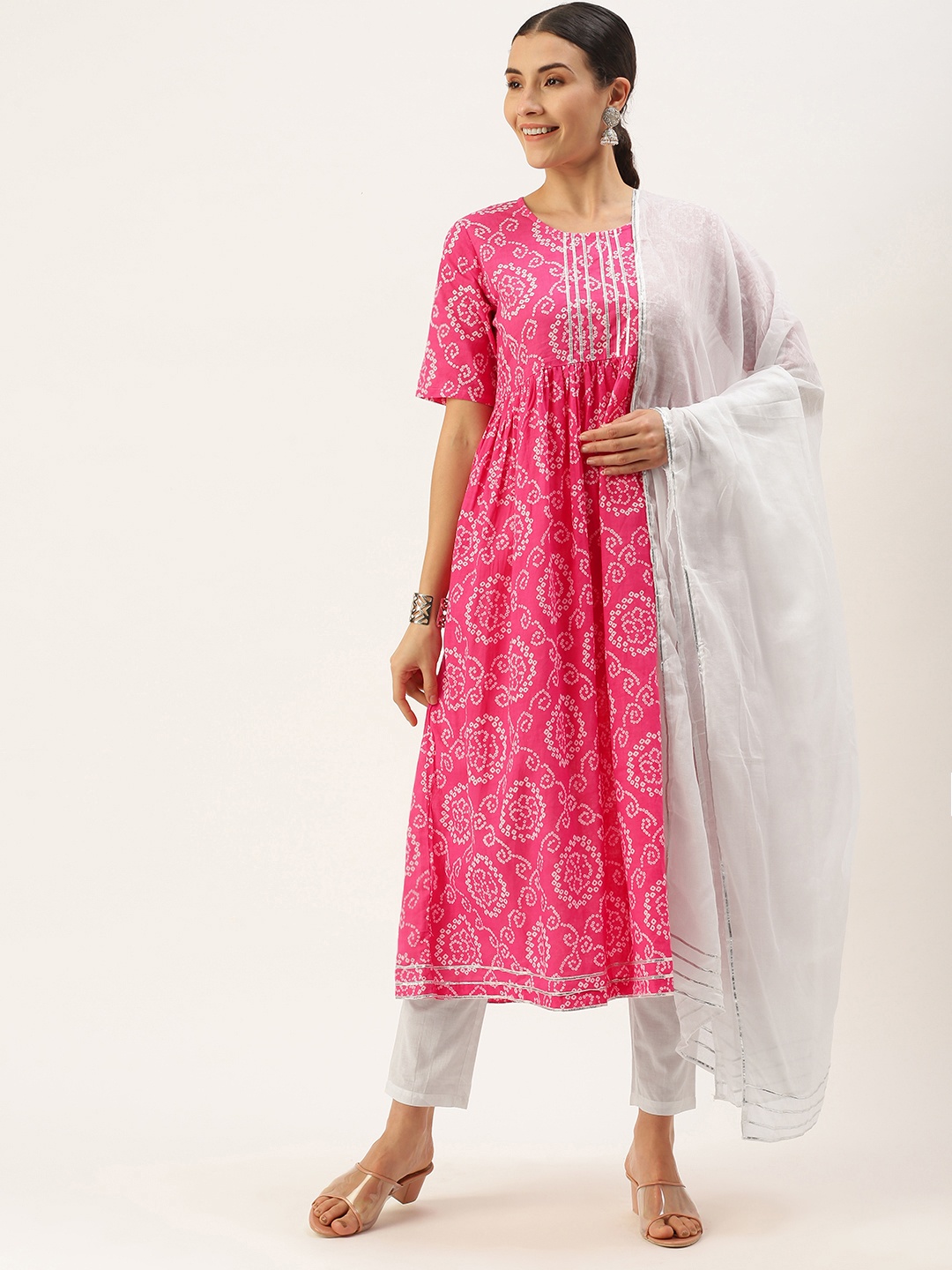 Saanjh Women Pink Bandhani Printed Regular Pure Cotton Kurta with Palazzos & With Dupatta
Saanjh Women Pink Bandhani Printed Regular Pure Cotton Kurta with Palazzos & With Dupatta