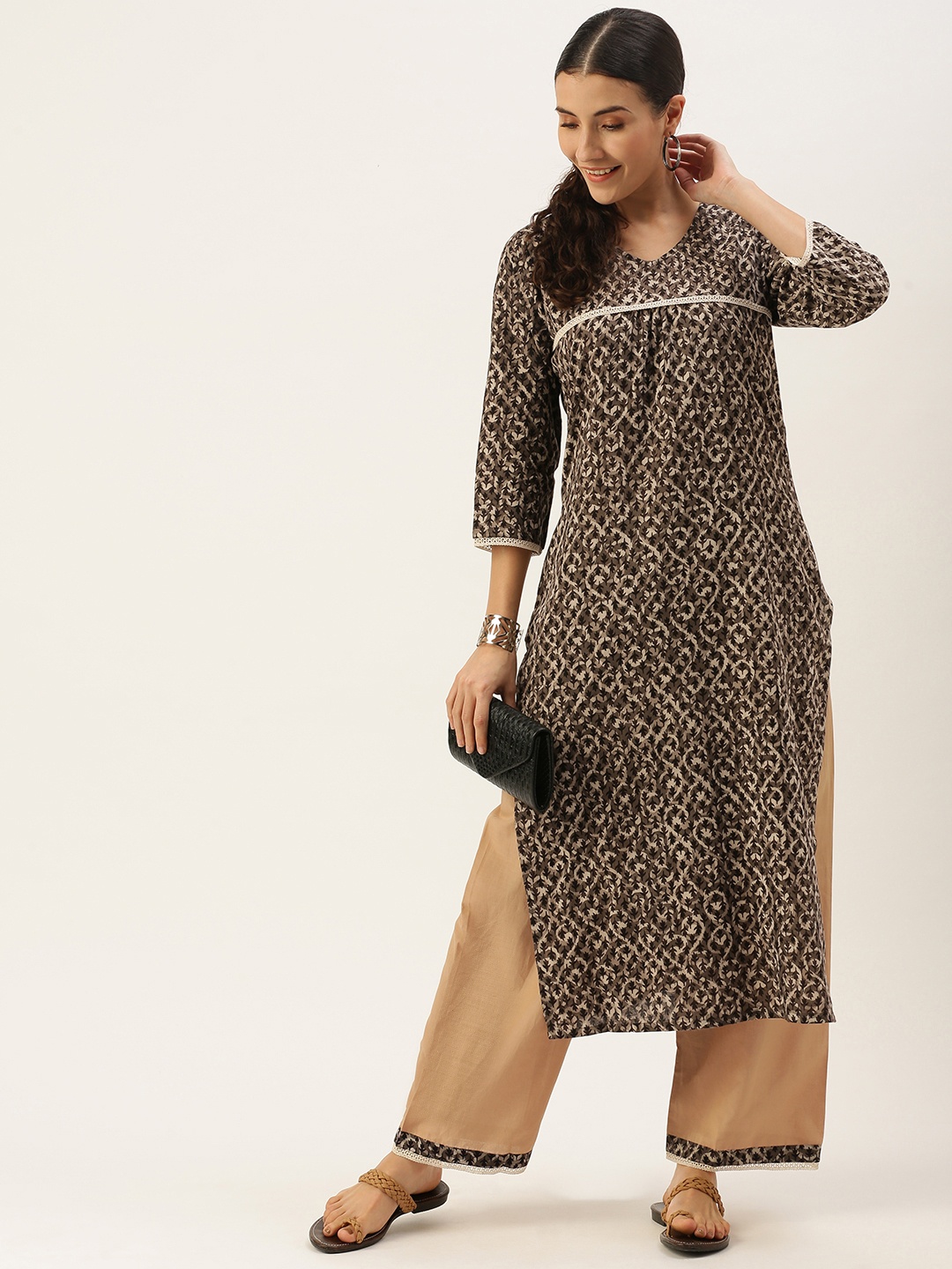 Saanjh Women Brown Ethnic Motifs Printed Regular Pure Cotton Kurta with Palazzos
Saanjh Women Brown Ethnic Motifs Printed Regular Pure Cotton Kurta with Palazzos